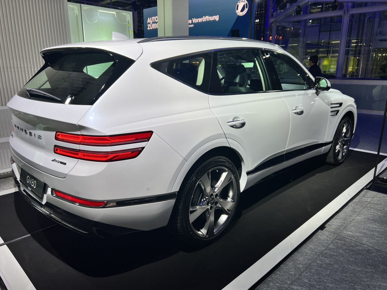 White SUV rear side with LED tail lights and alloy wheels