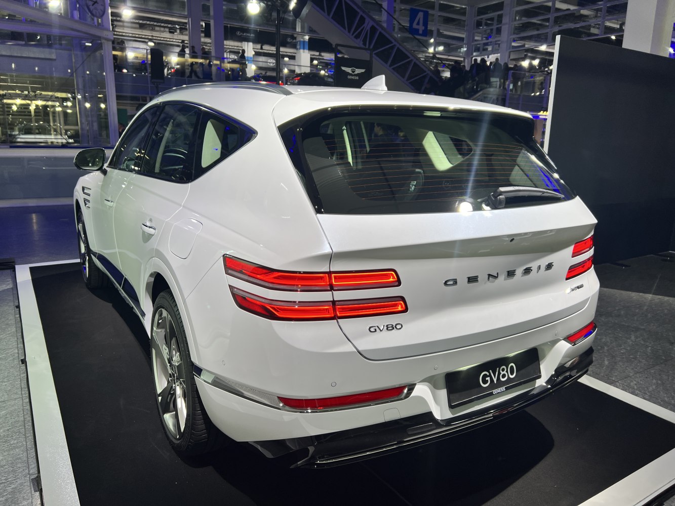 Rear of luxury SUV with triple-bar LED taillights and hatchback design