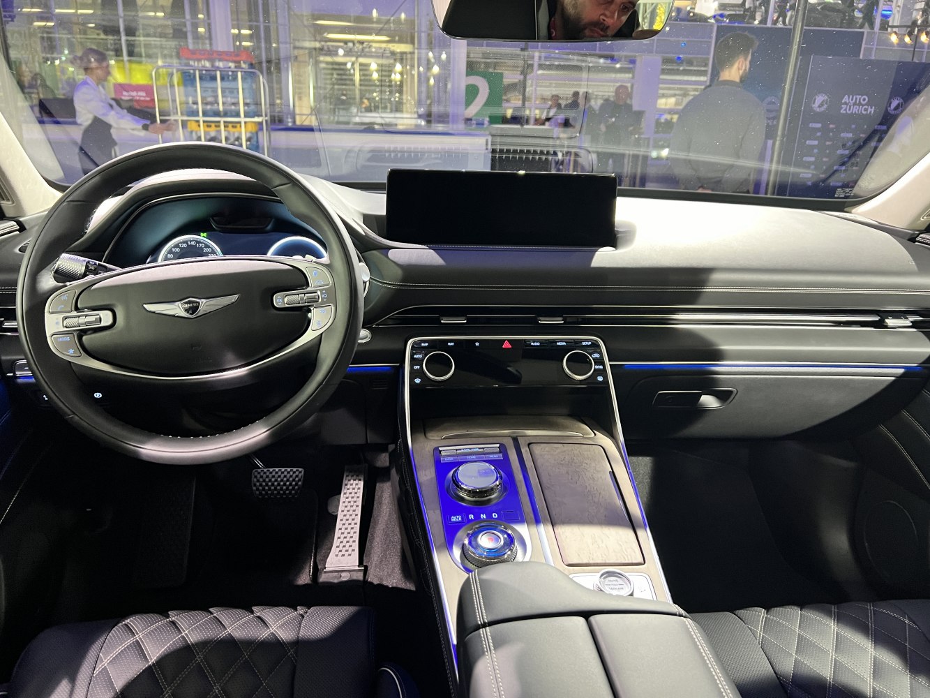 Modern luxury dashboard with multifunction steering wheel and large infotainment screen