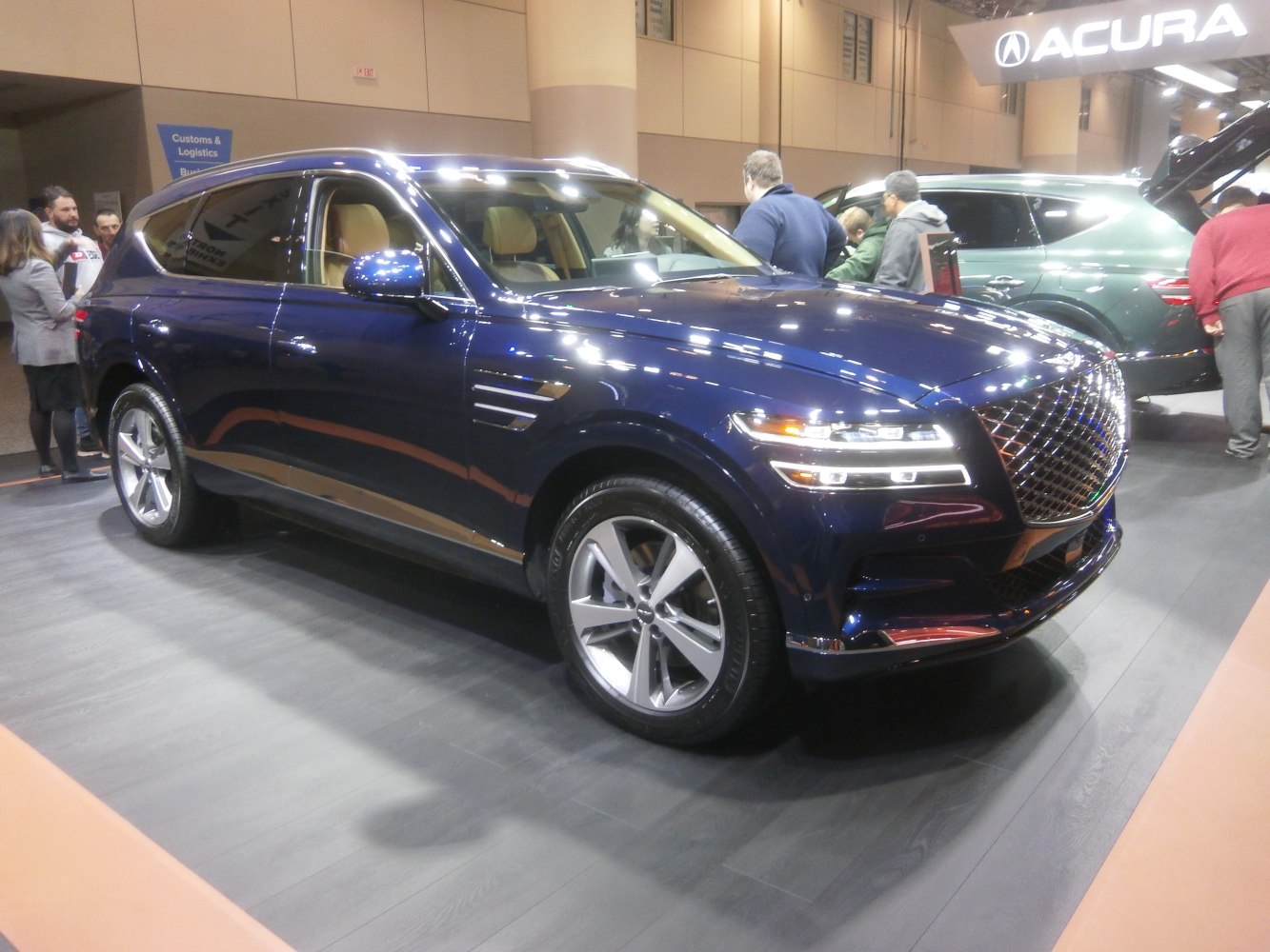 LED headlights and large front grille on luxury SUV