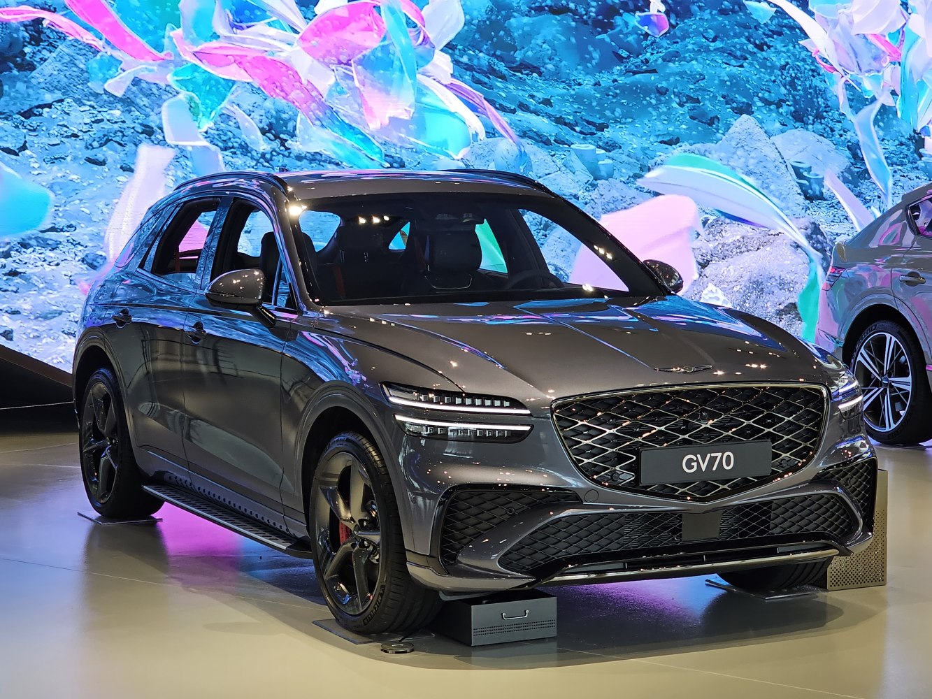 Front view with signature grille and dual LED headlights.