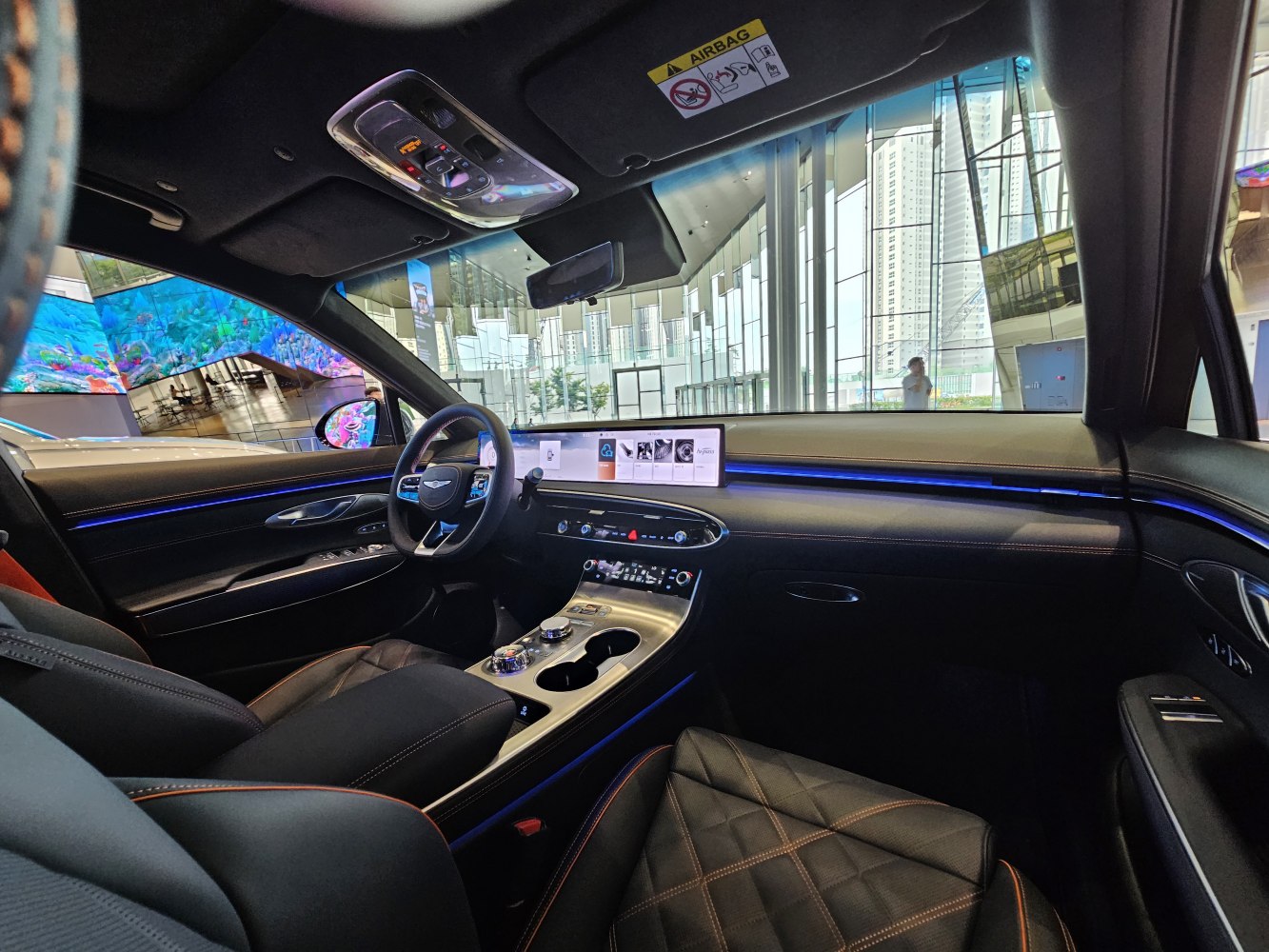 Luxury dashboard with panoramic digital display and ambient lighting