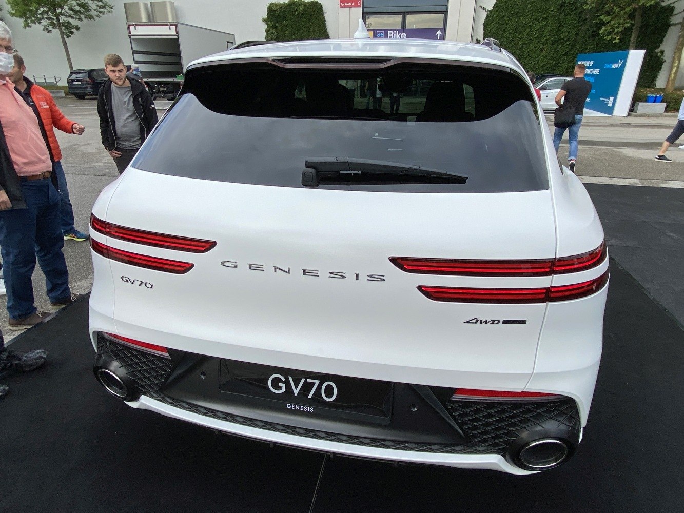 Elegant rear design with dual LED tail lights and AWD badge on SUV