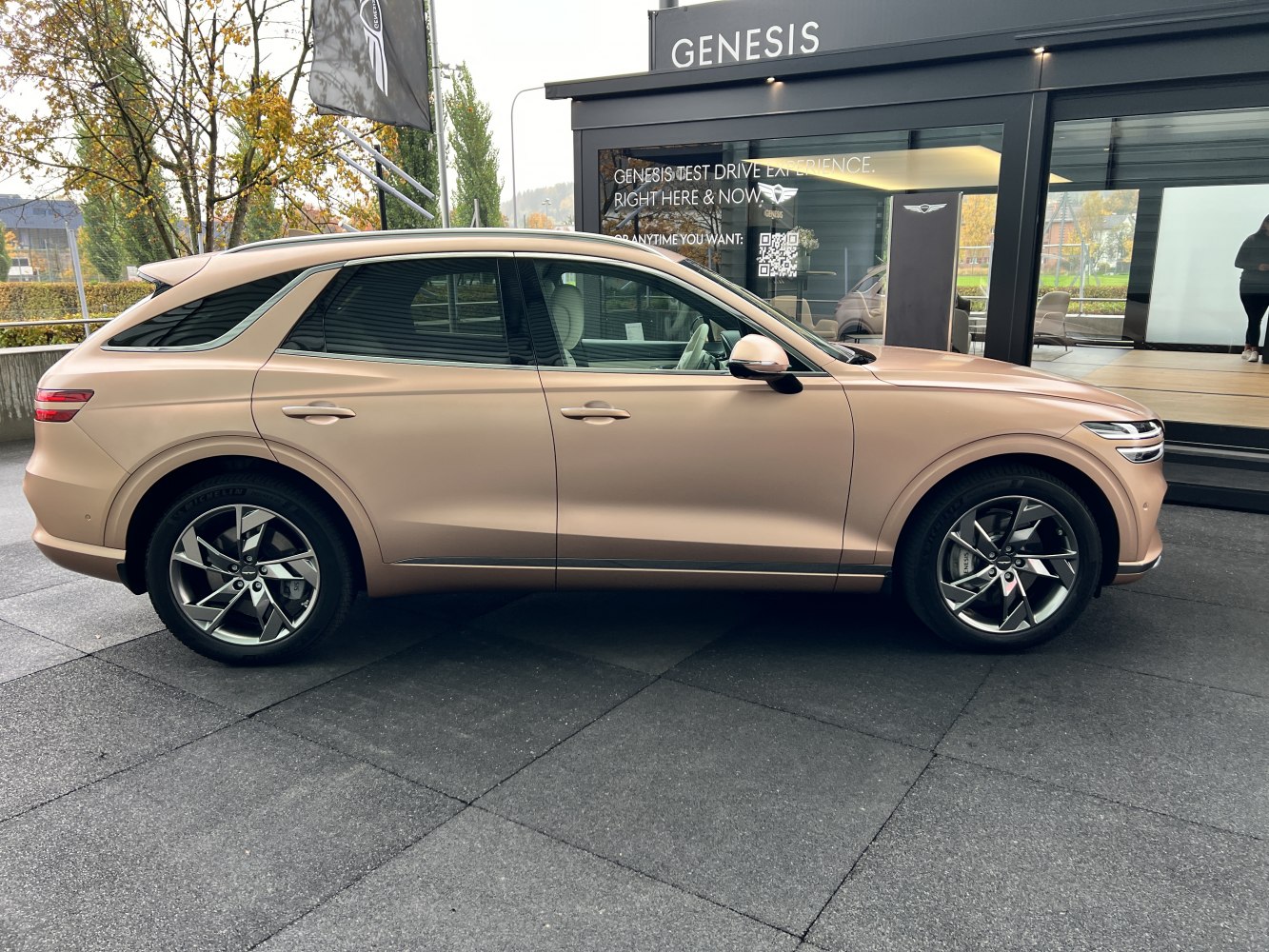Sleek side profile of an SUV with modern alloy wheels and tinted windows.