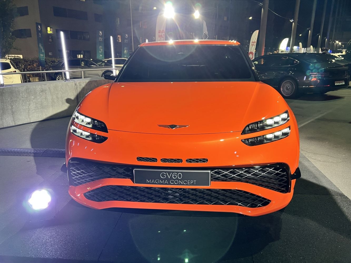 Front view with dual headlights and unique grille design