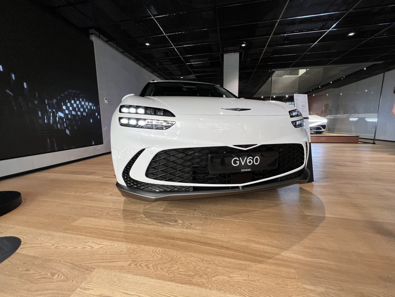 Front view with distinctive LED headlights and sporty grille