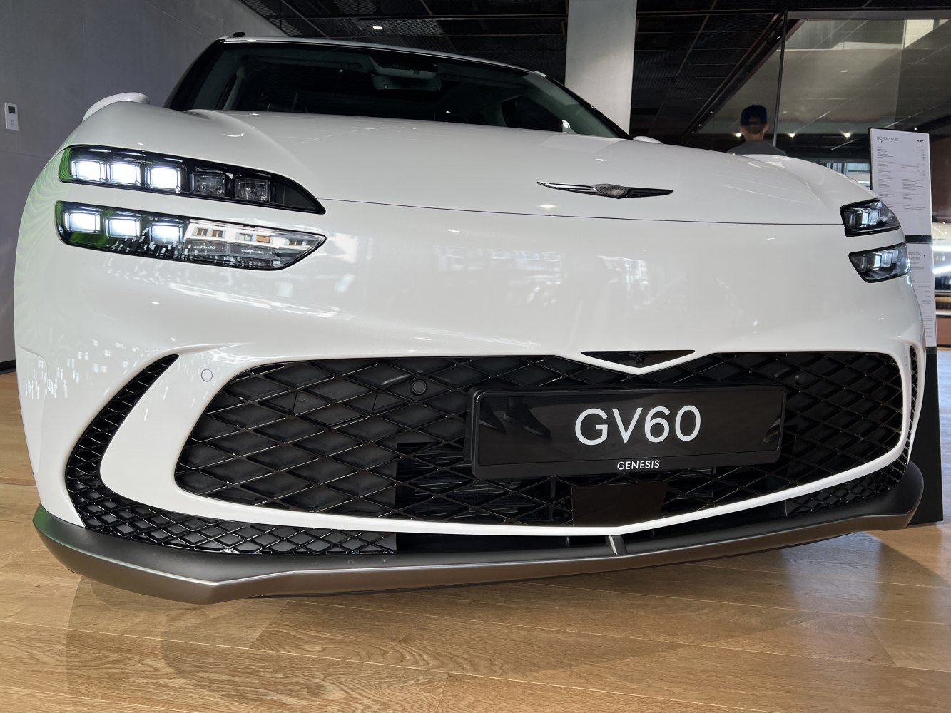 Distinctive split LED headlights and mesh grille front view