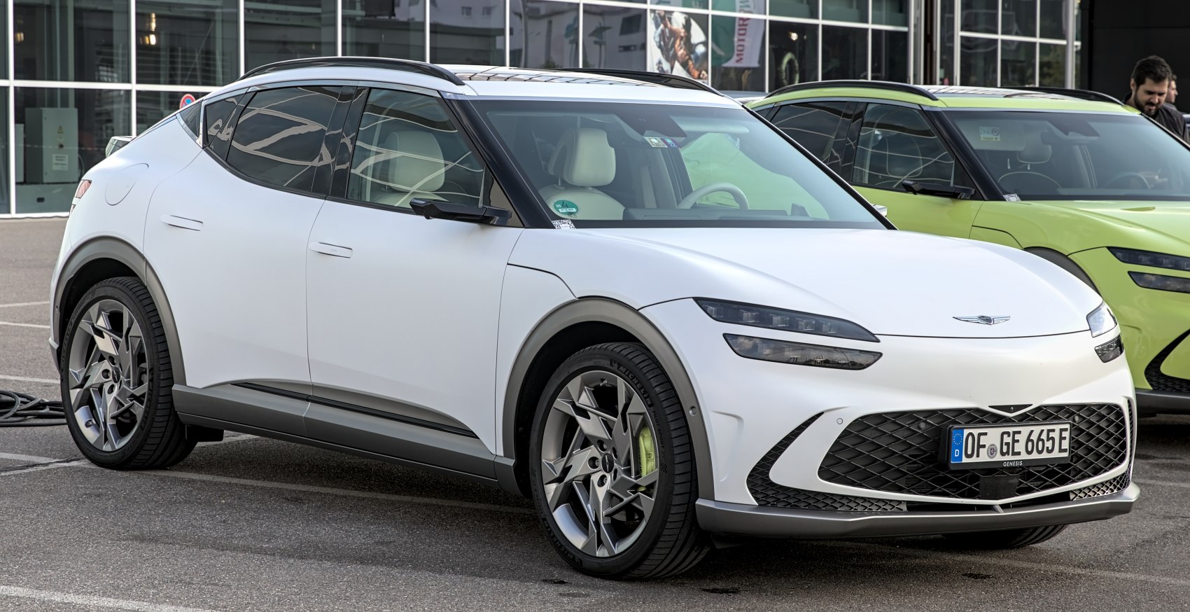 Electric SUV with split headlights and alloy wheels