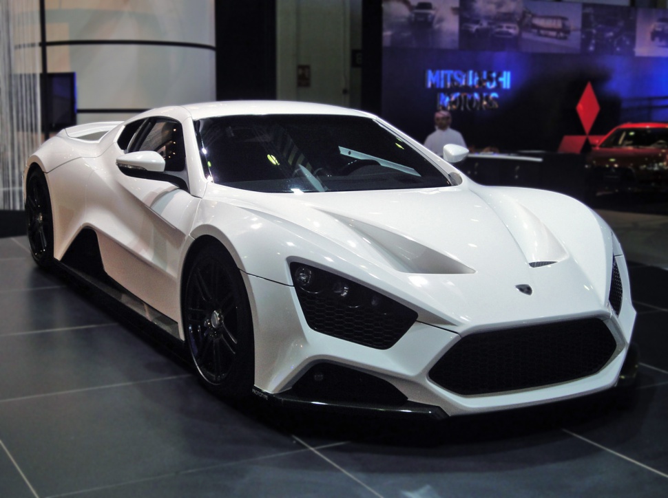 White hypercar with aggressive front design and aerodynamic features