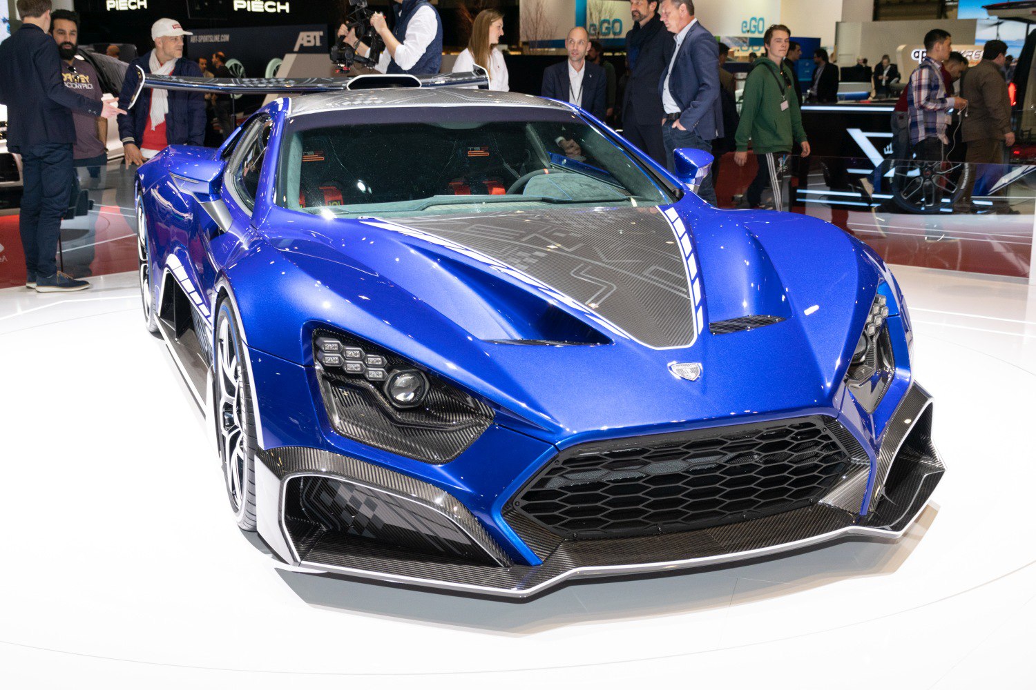 Aggressive aerodynamic front with carbon fiber hood