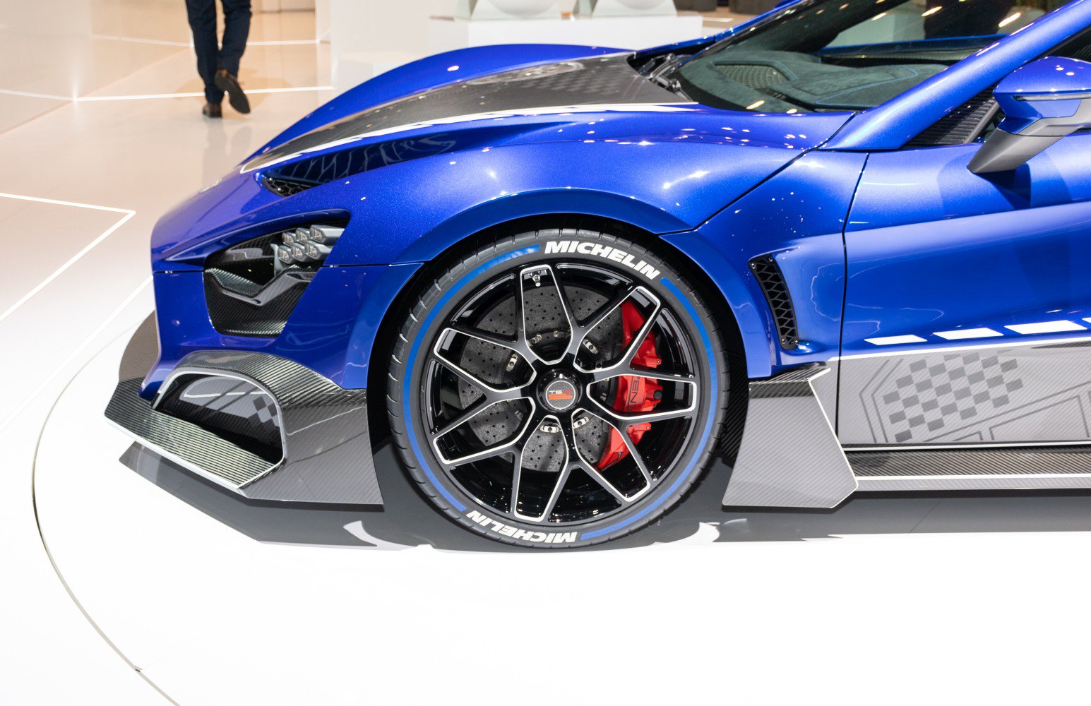 Front wheel with Michelin tire and carbon fiber aerodynamic parts