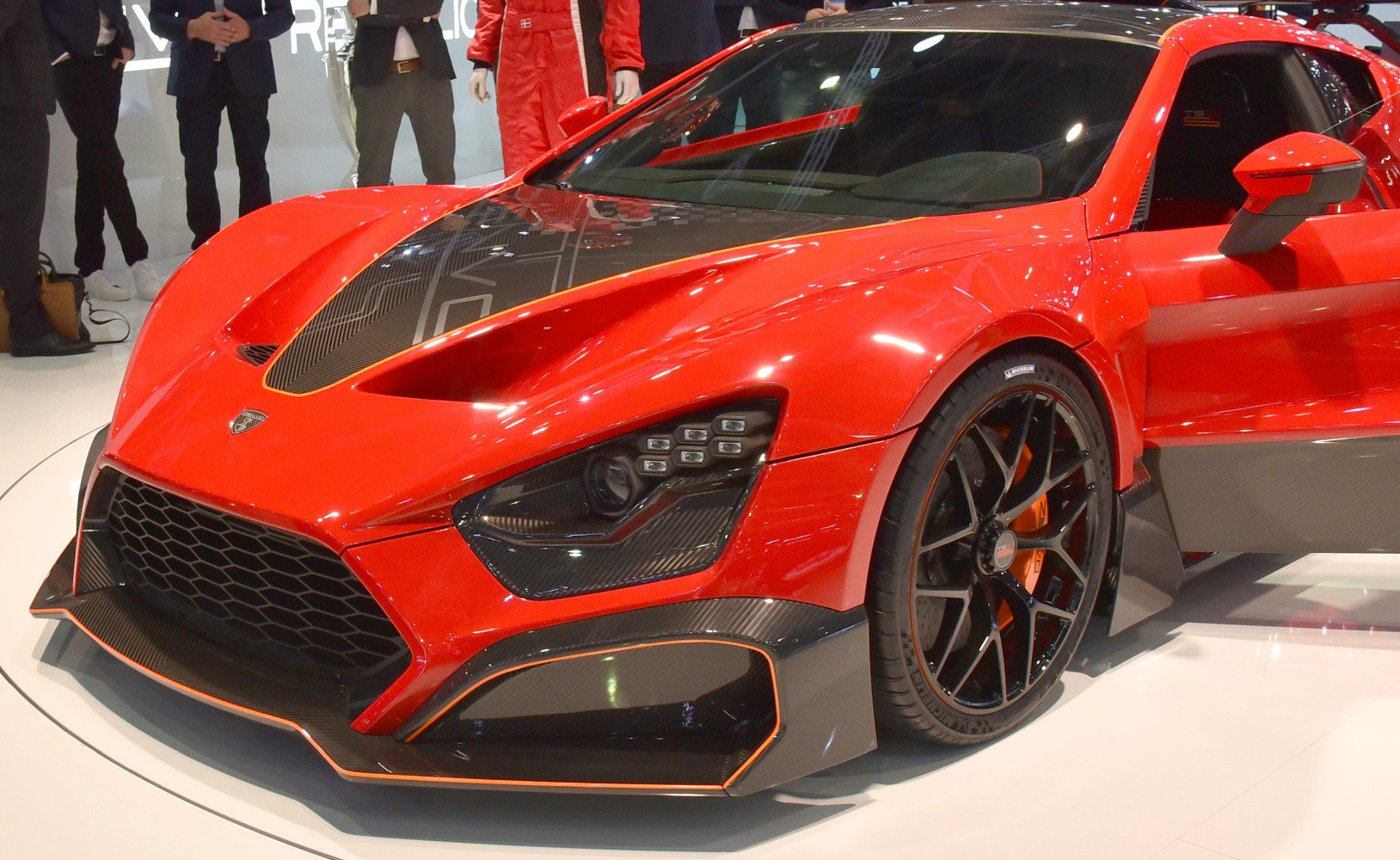 Aggressive front aero with carbon fiber and performance wheel close-up