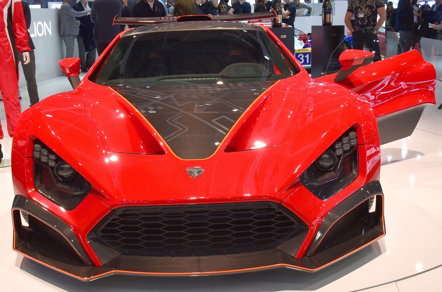 Aggressive front design with carbon fiber hood and distinct LED headlights