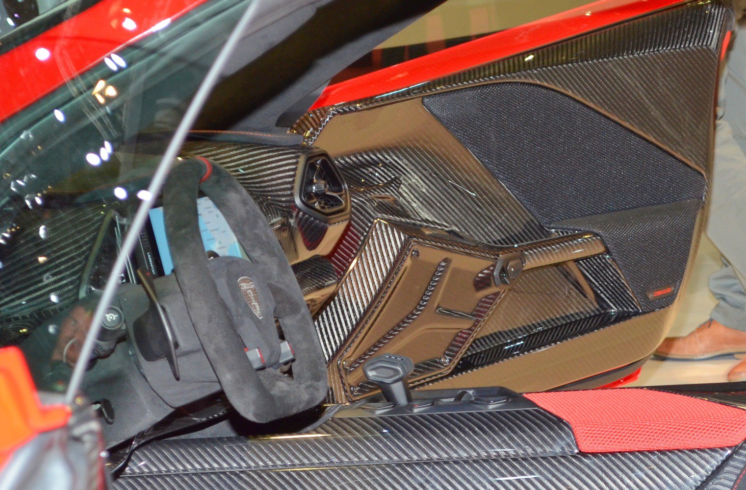 Carbon fiber interior panels with suede steering wheel