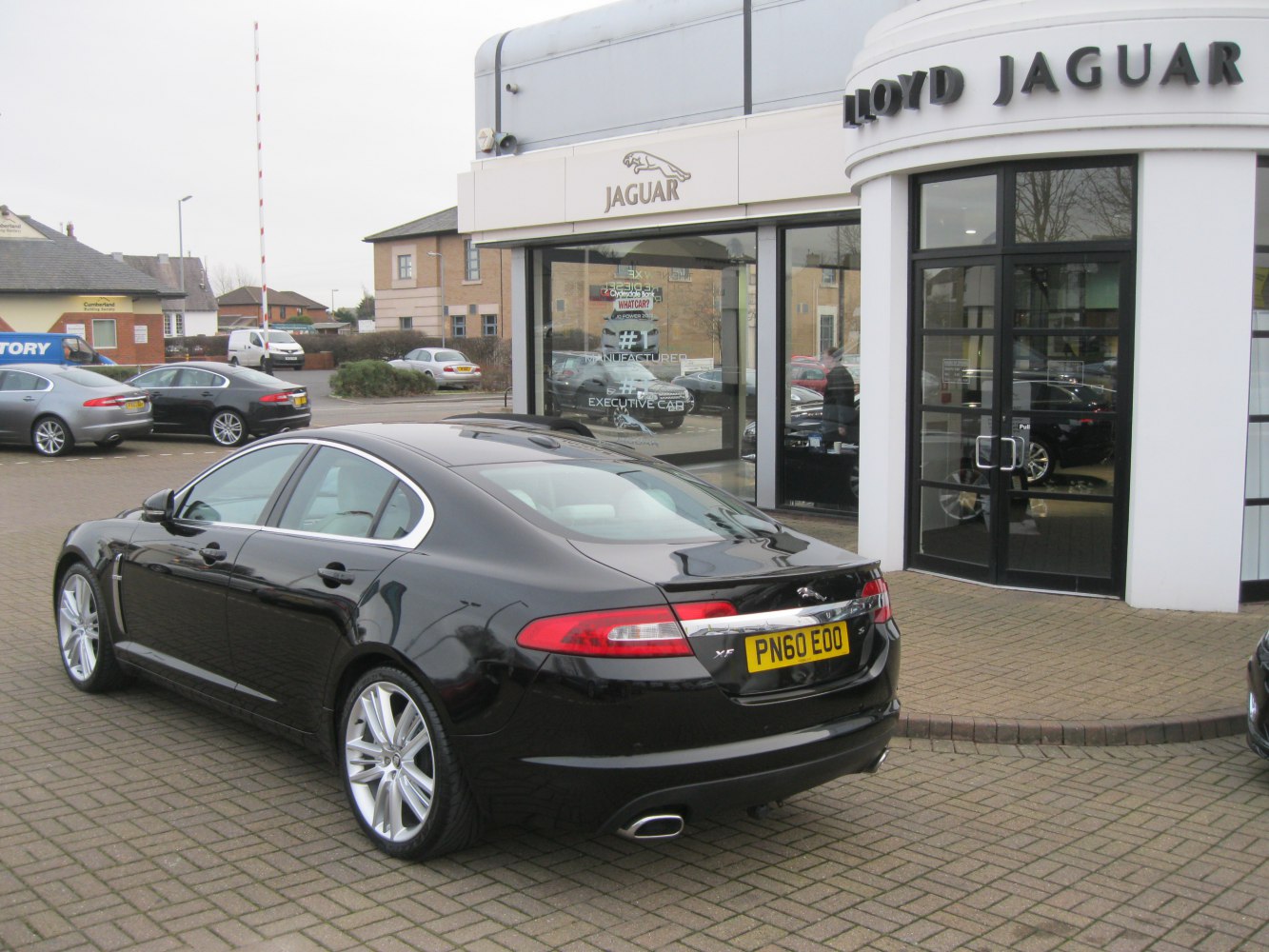Rear view with signature taillights and dual exhaust