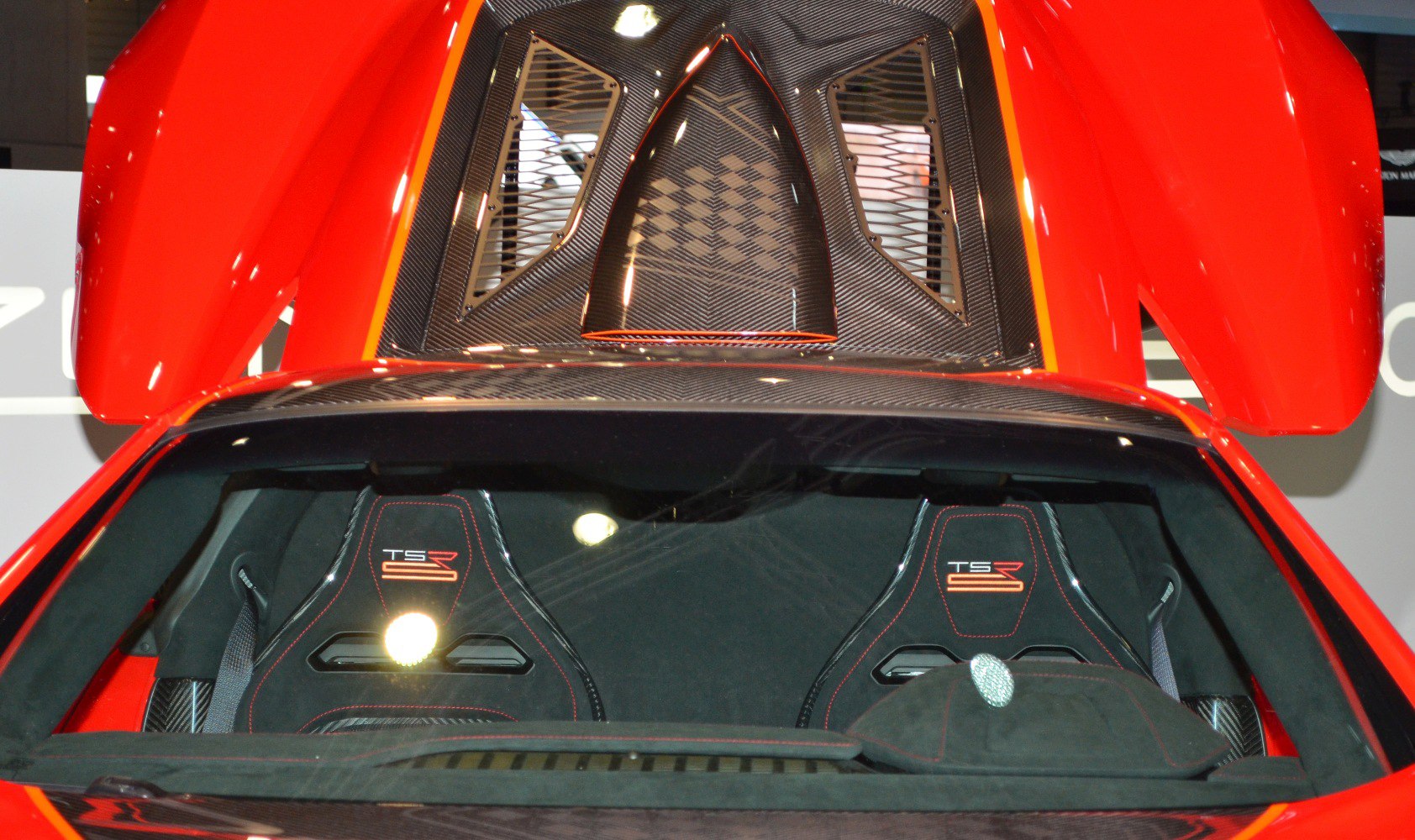 Interior racing seats and carbon fiber rear engine cover with air vents