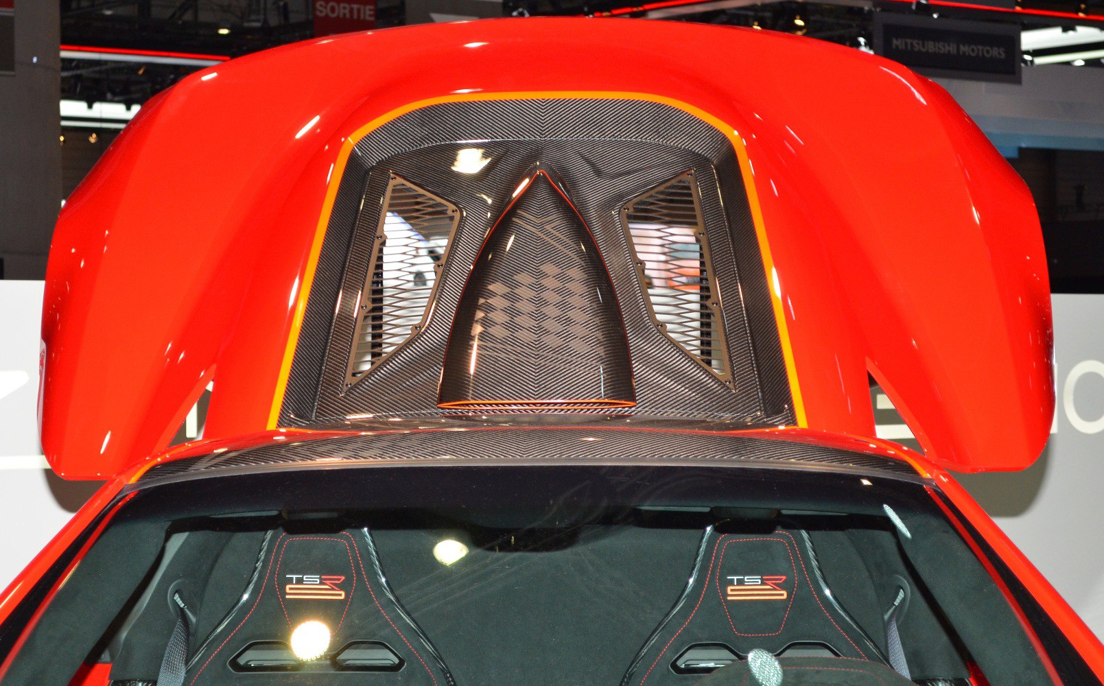 Carbon fiber engine cover with ventilation and TSR-S branded racing seats