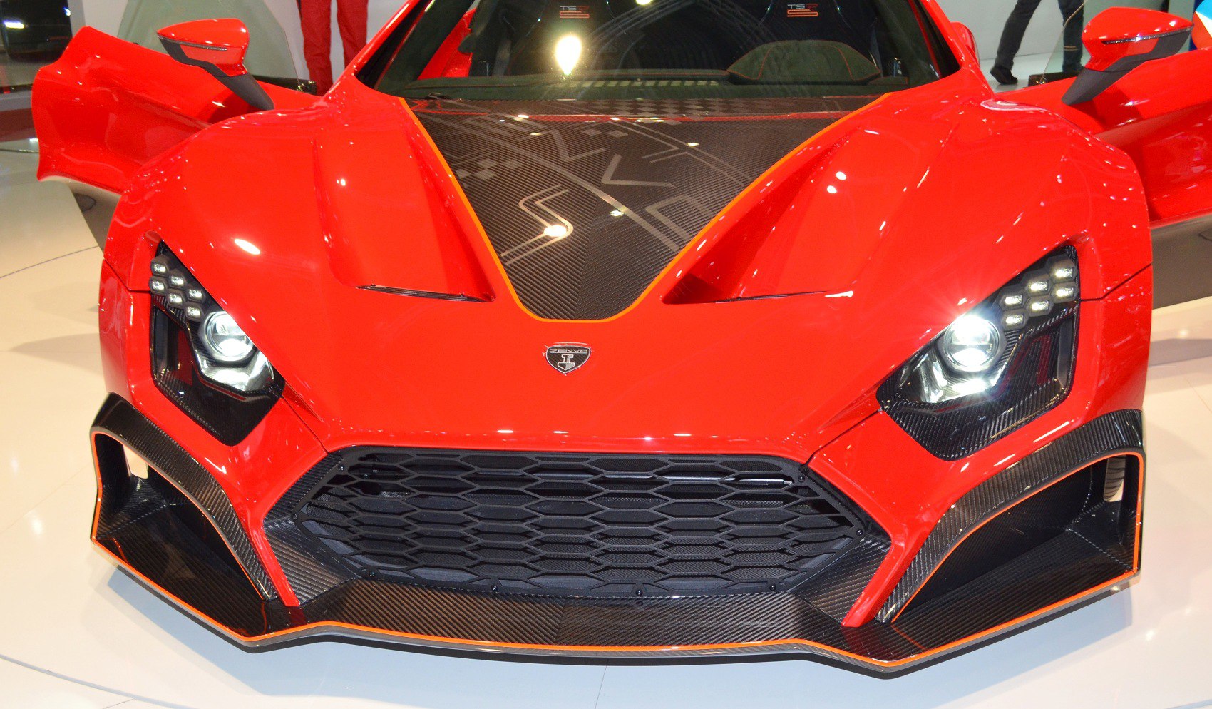 Aggressive front fascia with carbon fiber hood and LED headlights