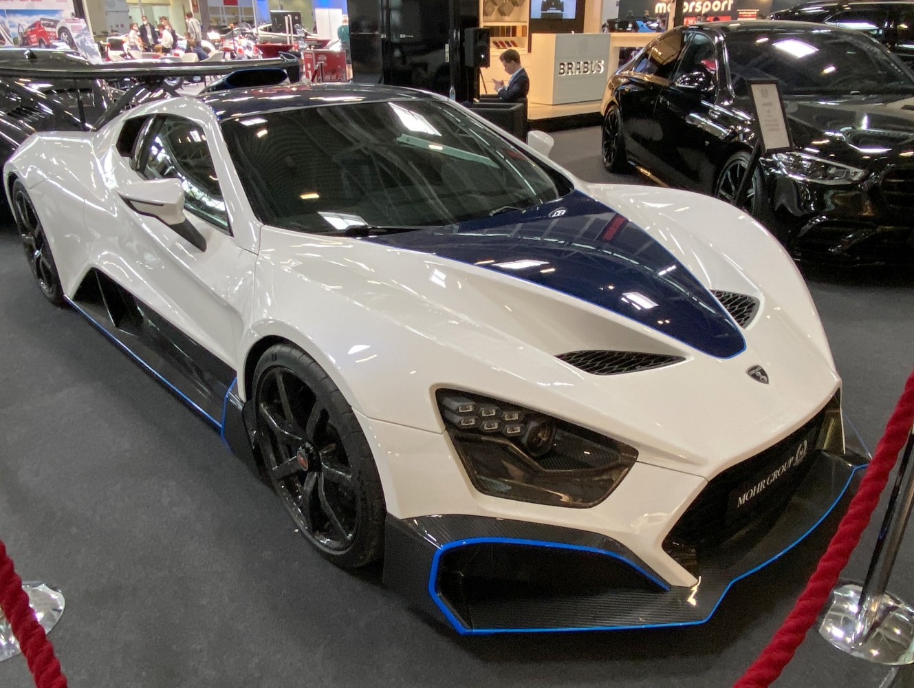 Aerodynamic supercar design with advanced headlights and carbon fiber elements