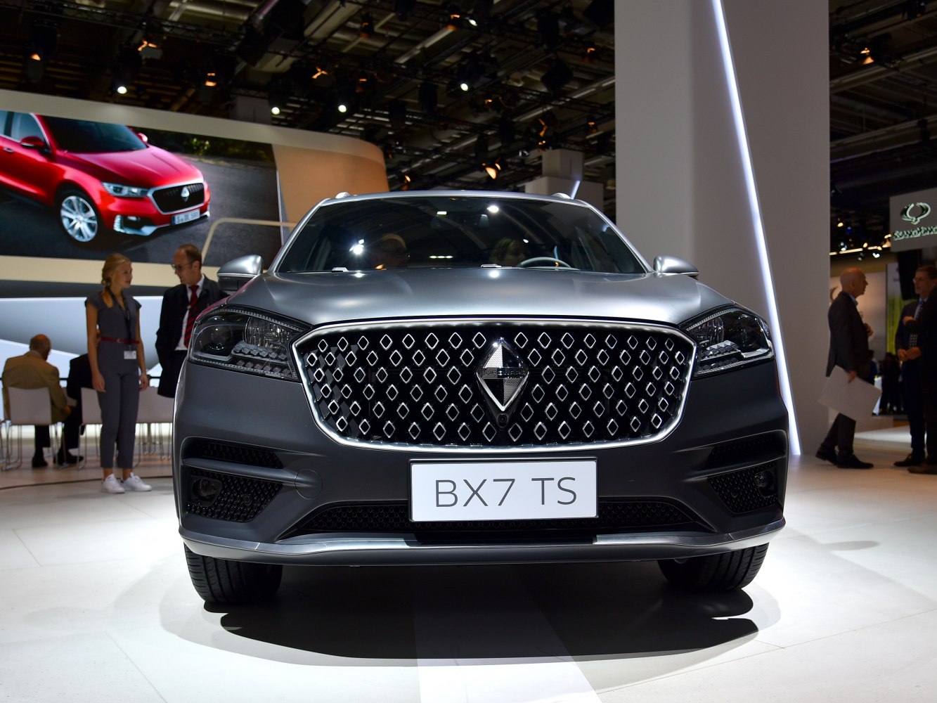 Front grille with diamond pattern and sleek headlights
