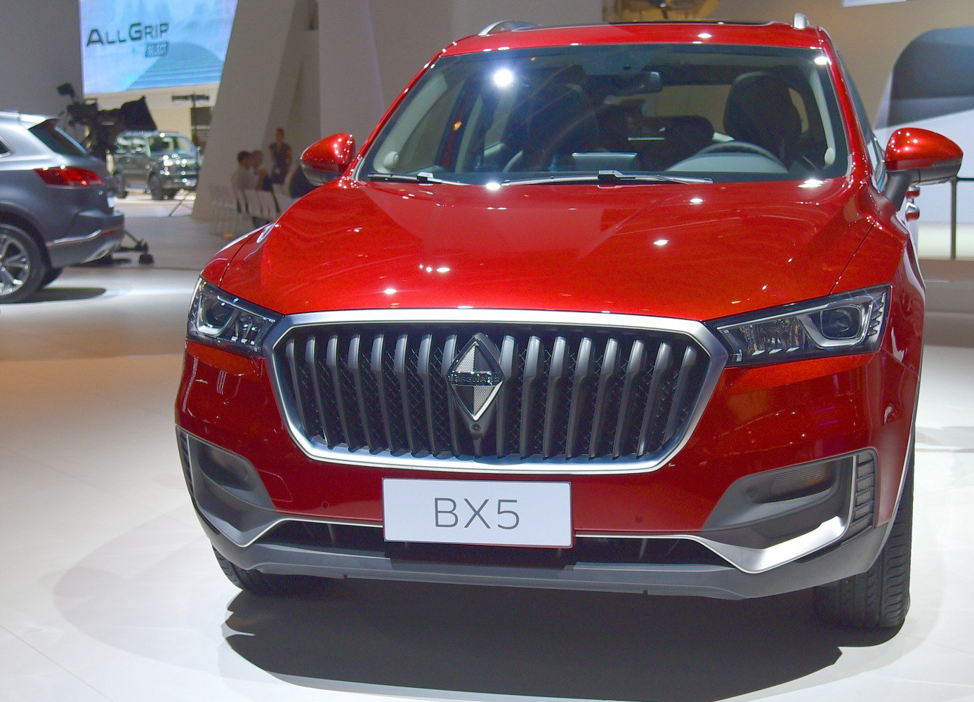 Bold vertical grille with sleek headlights on SUV front view