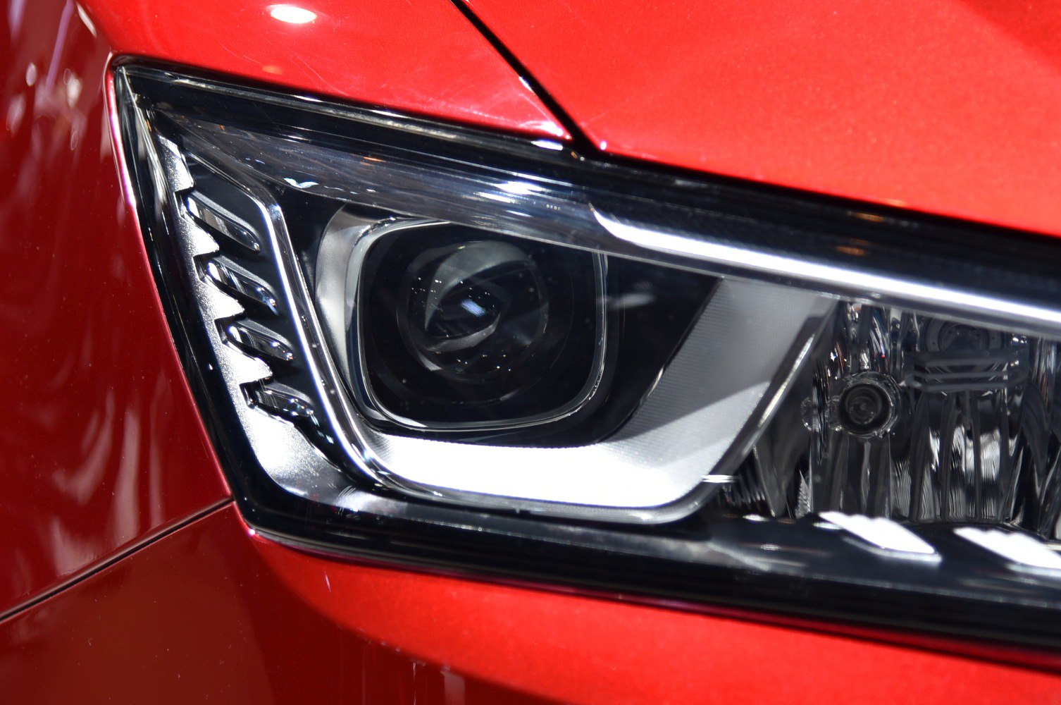 Close-up of Borgward BX5 LED headlight with sharp, modern design