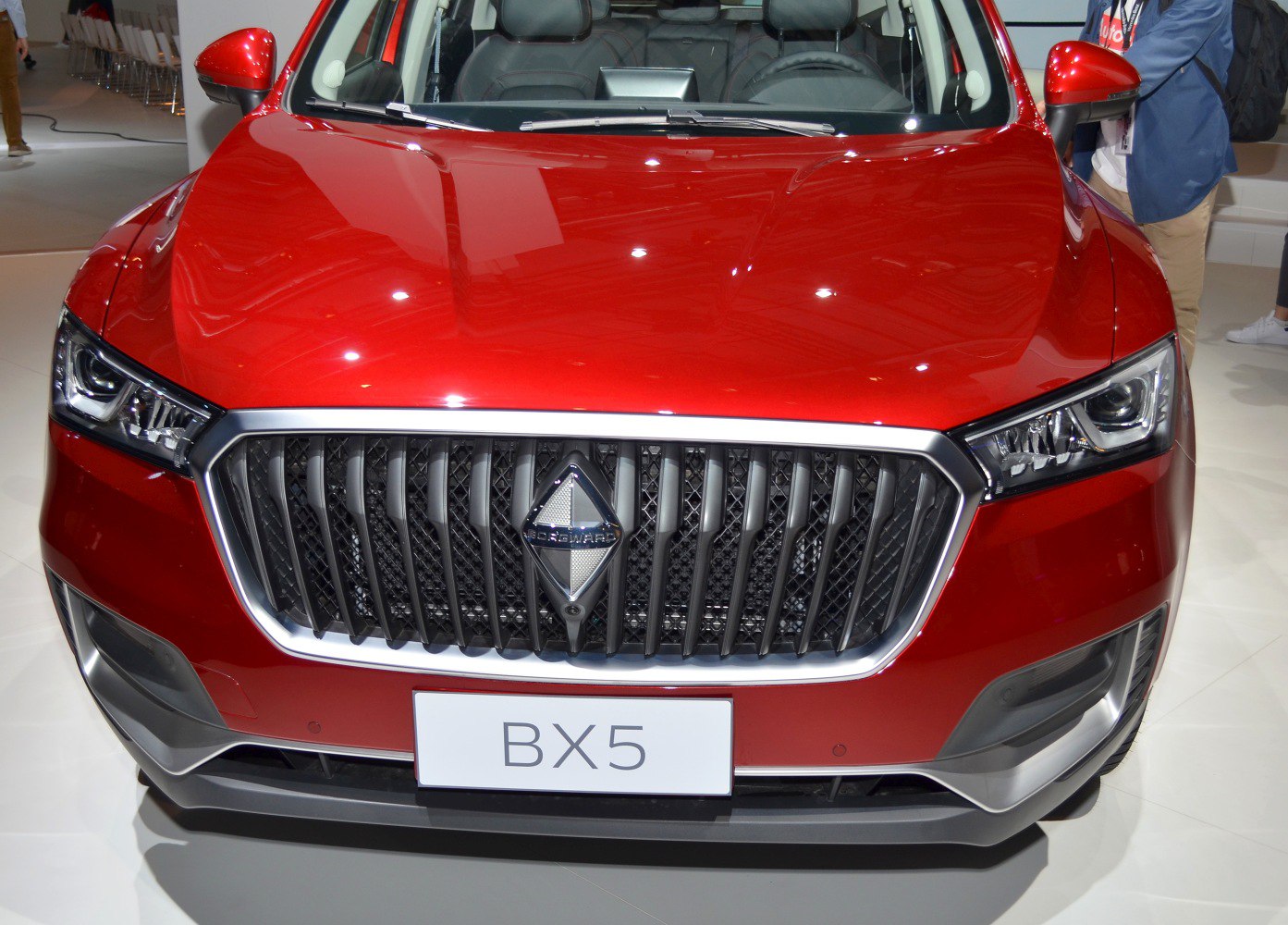 Close-up of SUV front grille and LED headlights