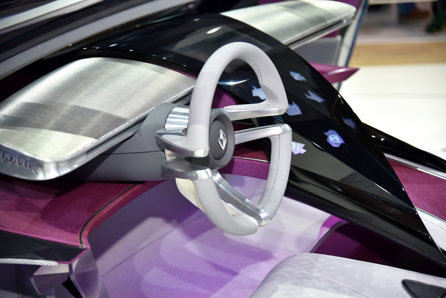Futuristic steering wheel and sleek modern dashboard