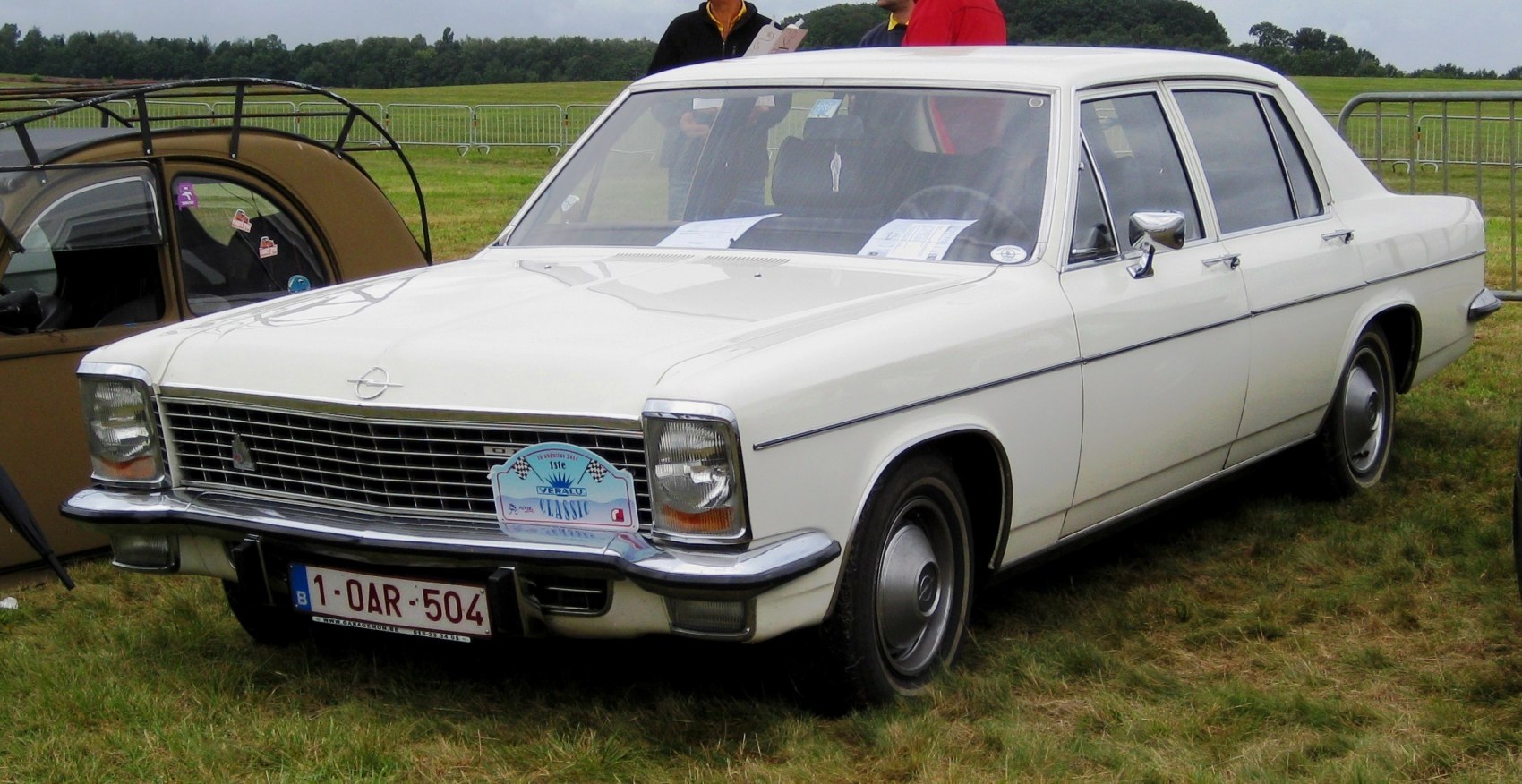 Large sedan with rectangular headlights and prominent chrome grille