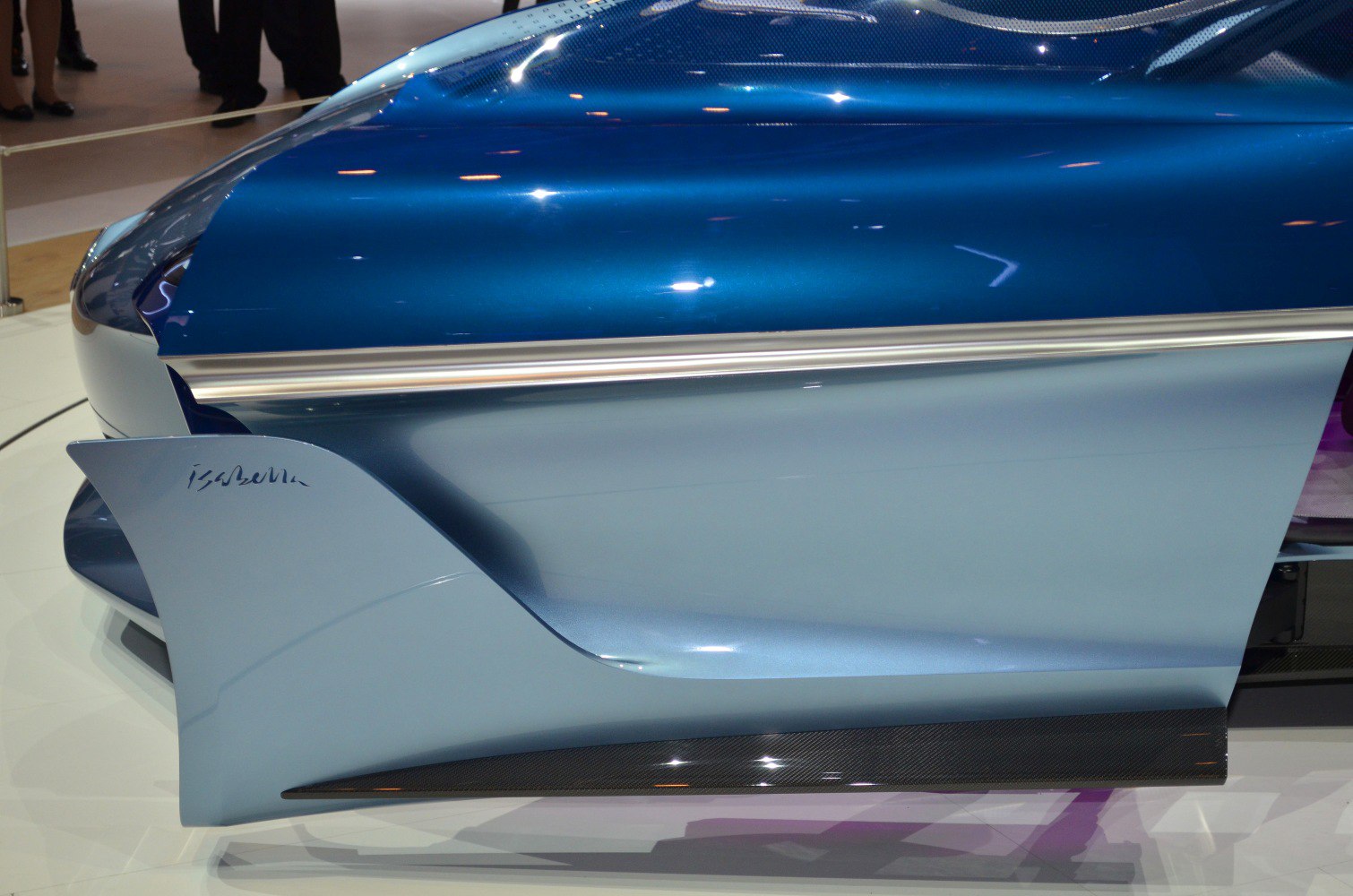 Avant-garde car door in blue and silver with carbon fiber trim.