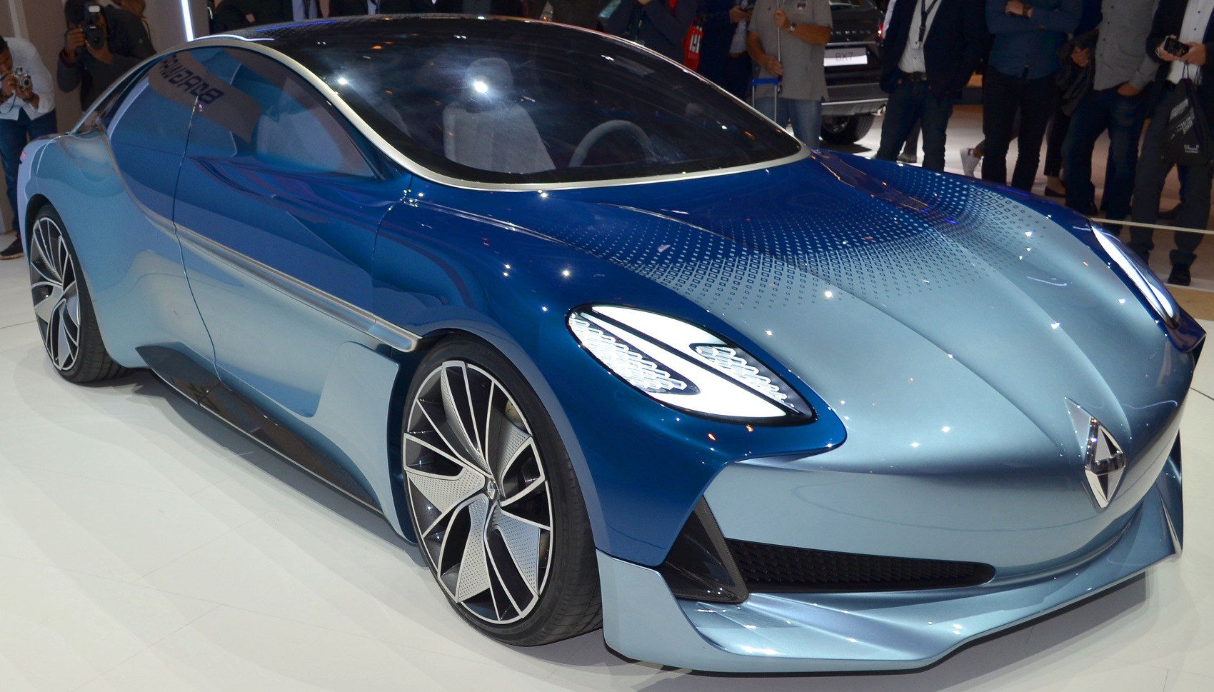 Futuristic blue coupe with distinctive LED headlights and aerodynamic shape