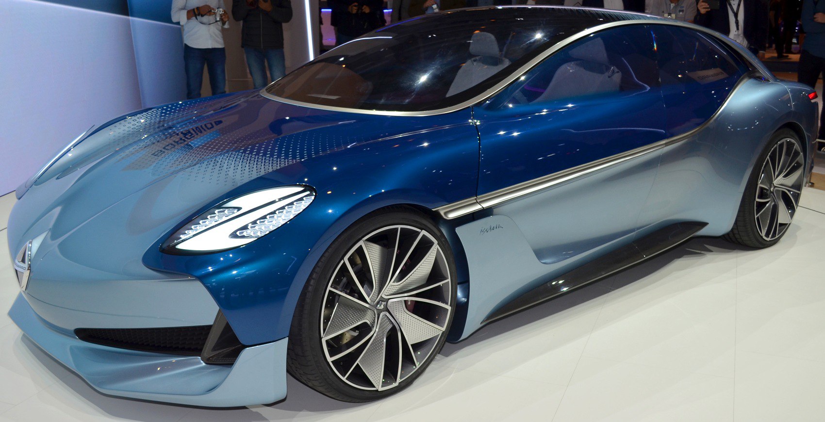 Futuristic aerodynamic blue concept car with large alloy wheels