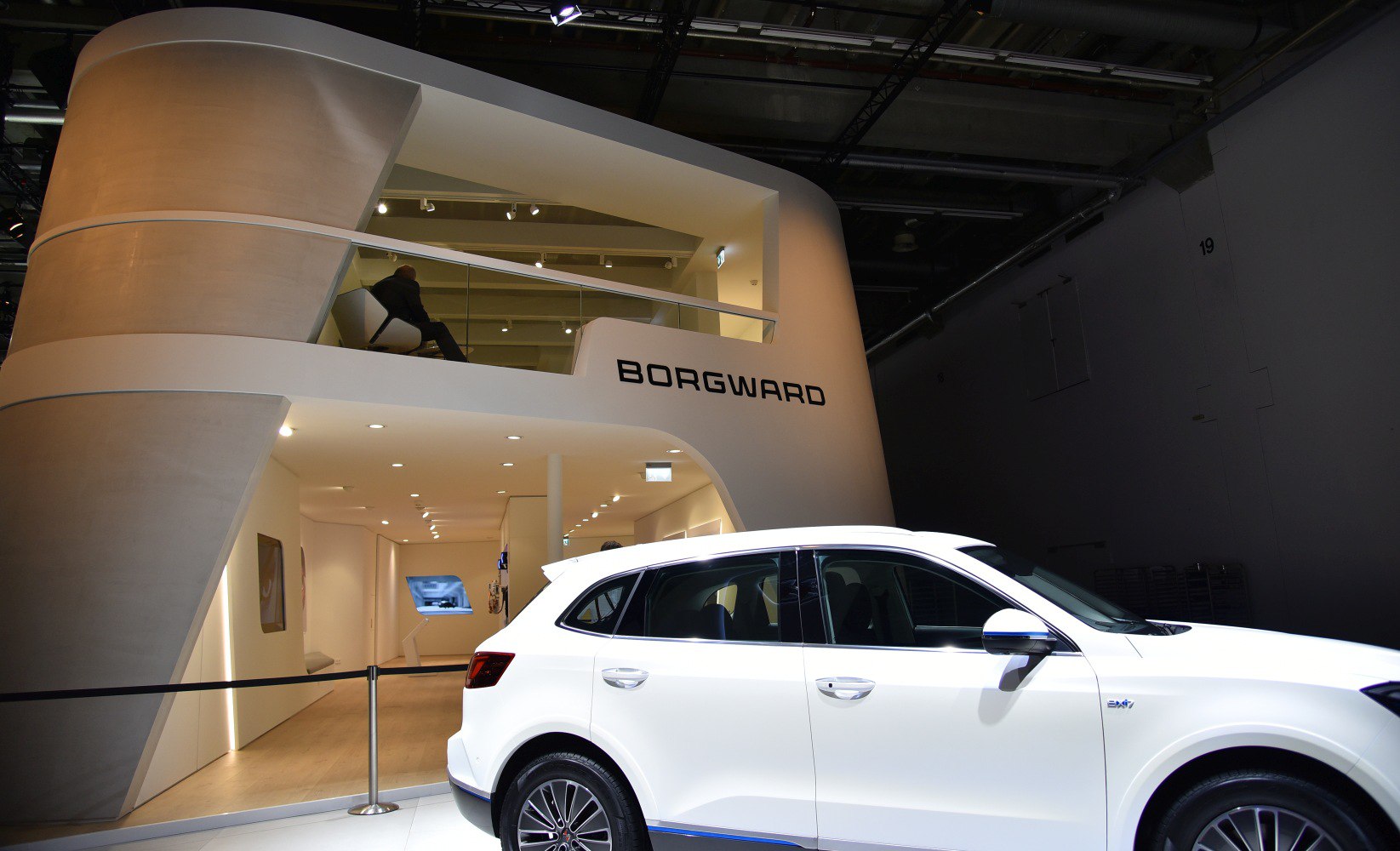 White SUV side profile with modern, sleek design and tinted windows