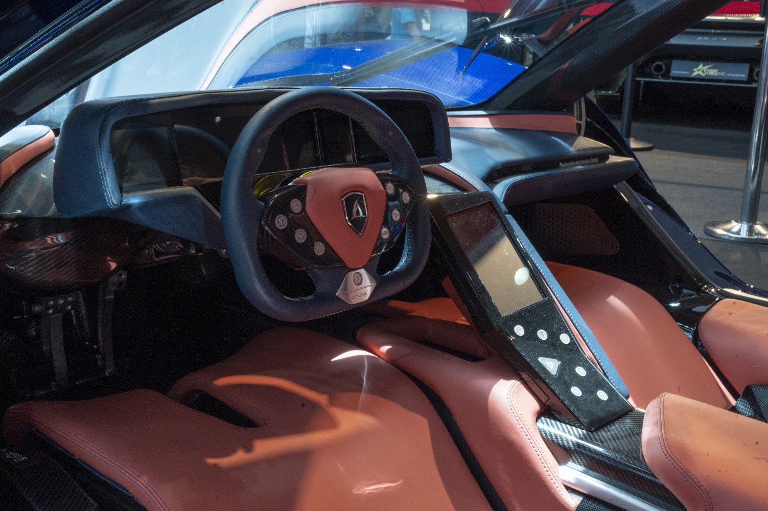Futuristic electric hypercar cockpit with digital dashboard and central touchscreen