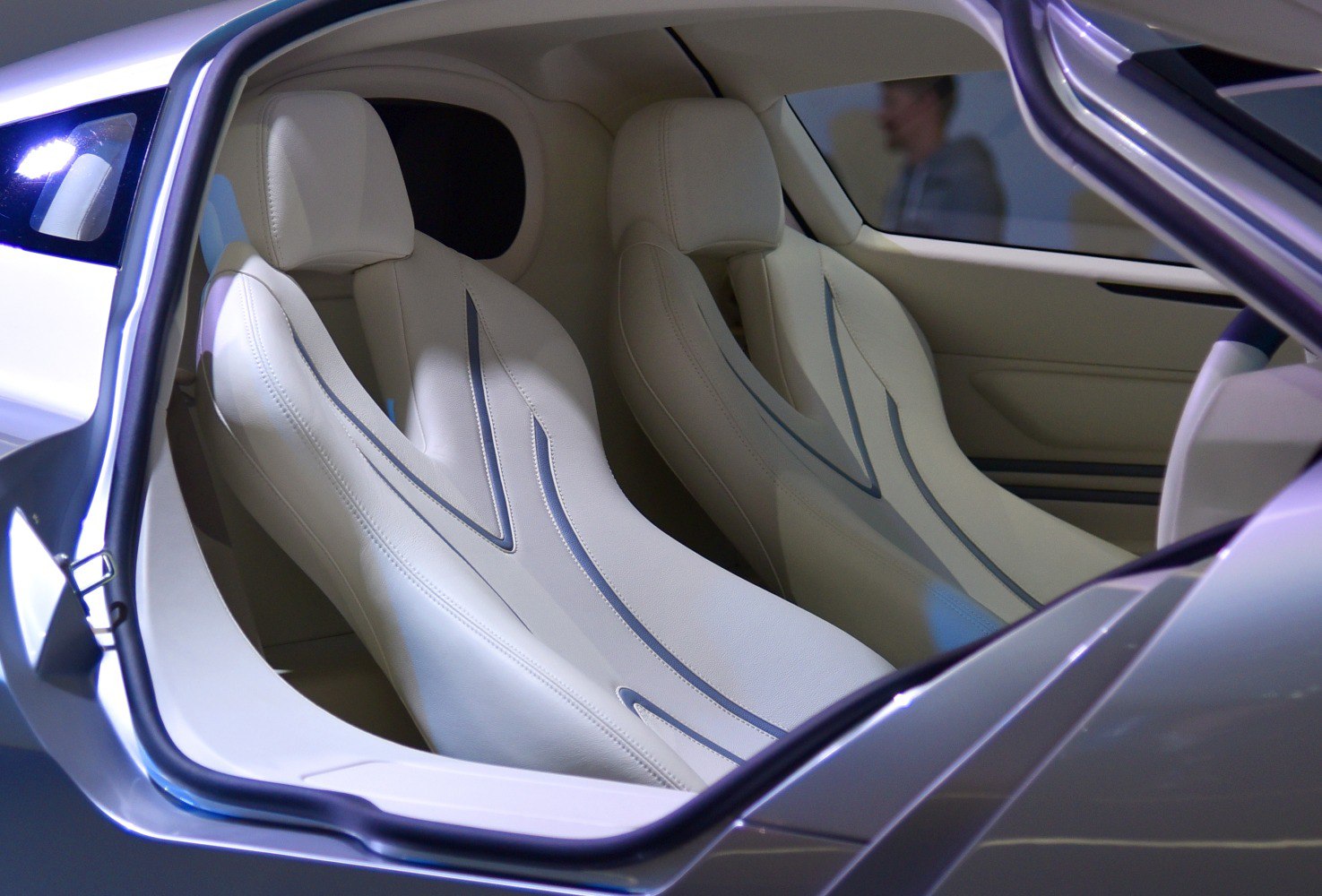Futuristic white ergonomic car seats with modern detailing