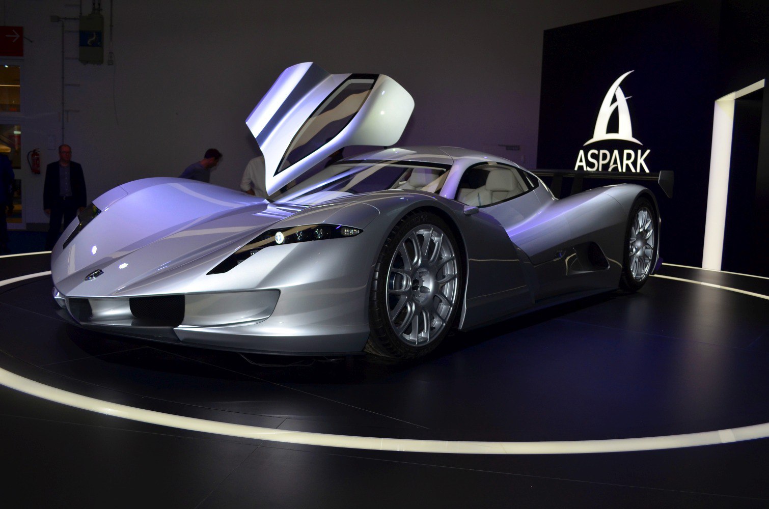 Silver sports car with butterfly door and aerodynamic body