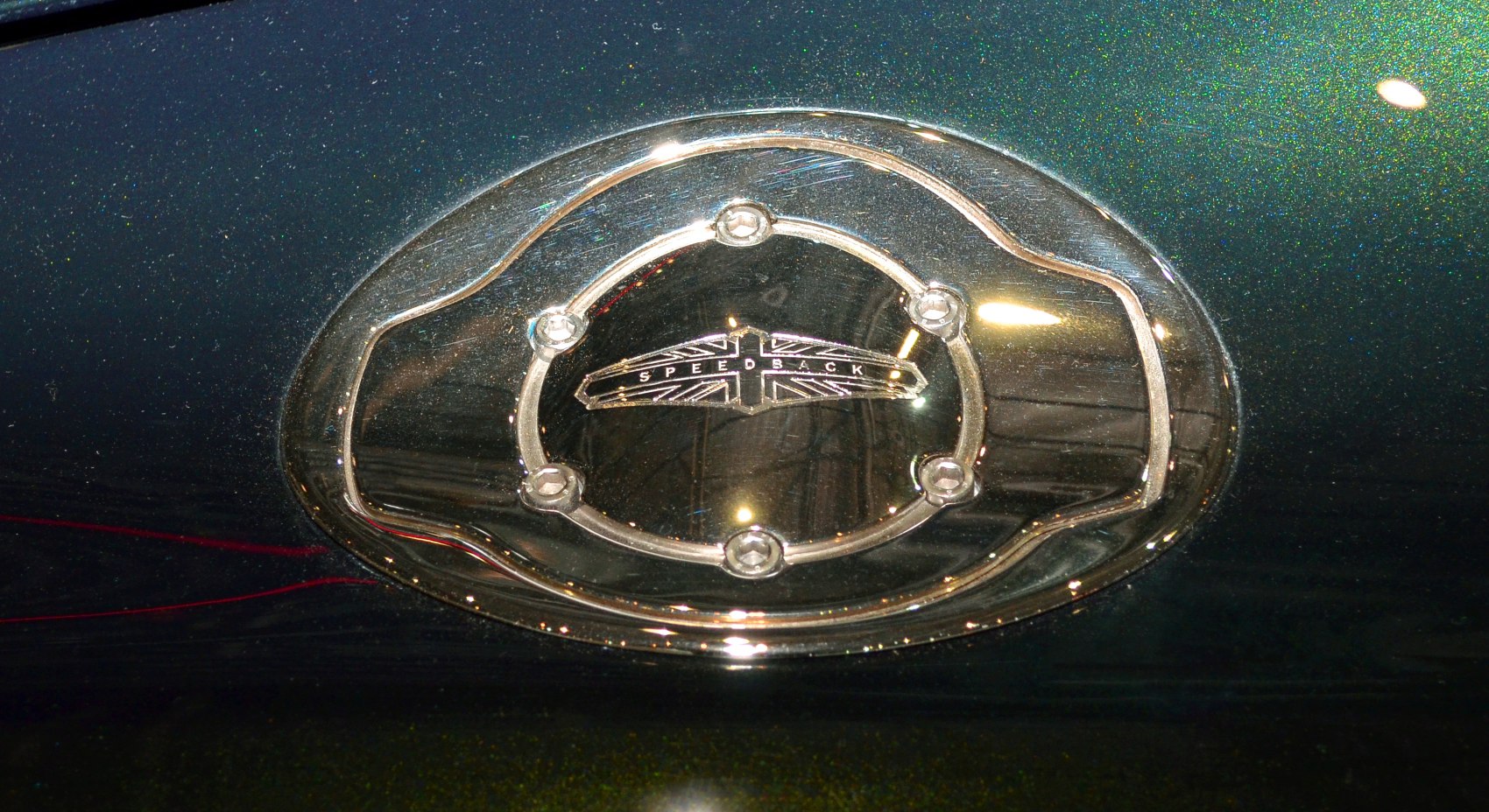 Classic styled metallic fuel cap with Speedback emblem