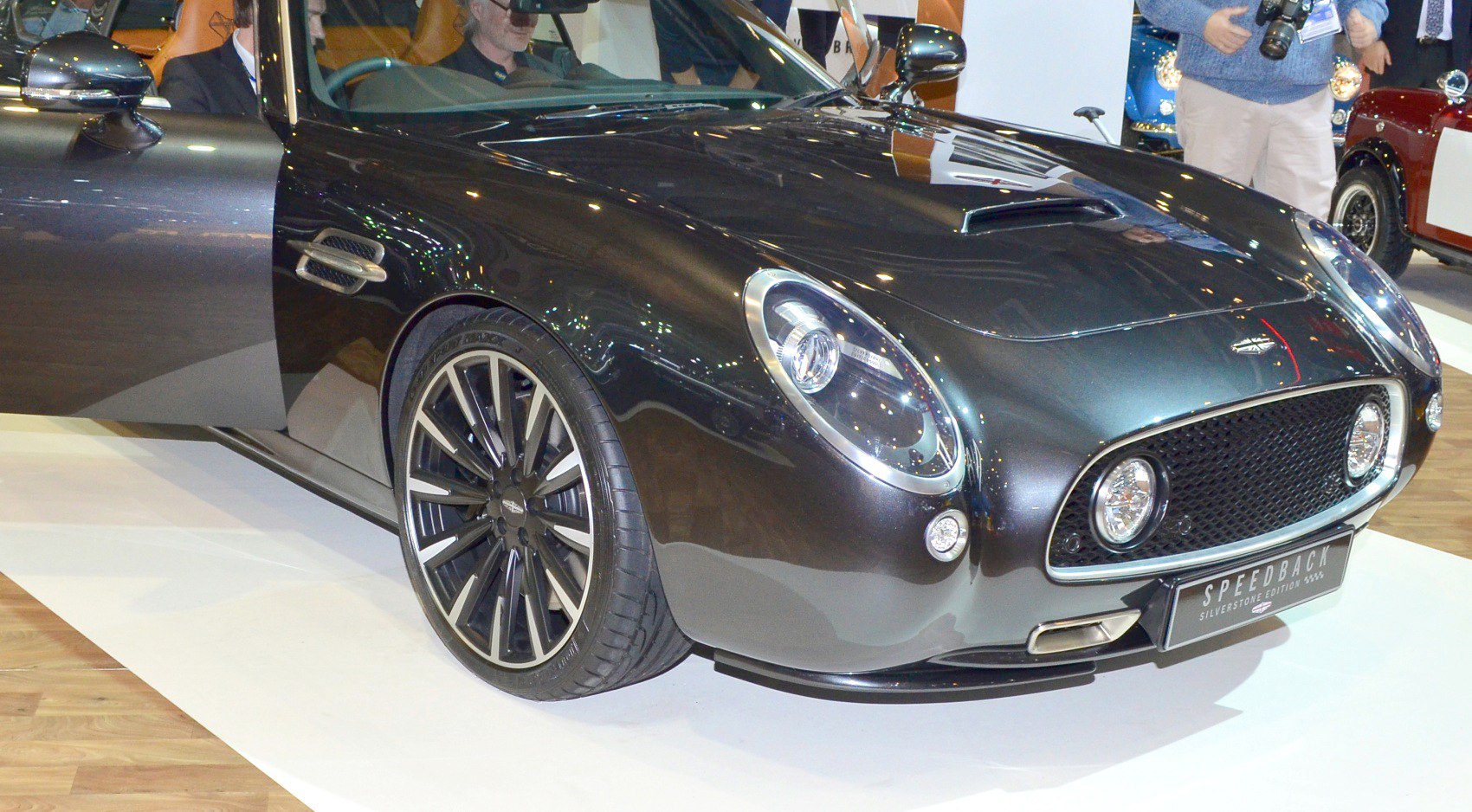 Front view with distinctive headlights and sporty alloy wheel design