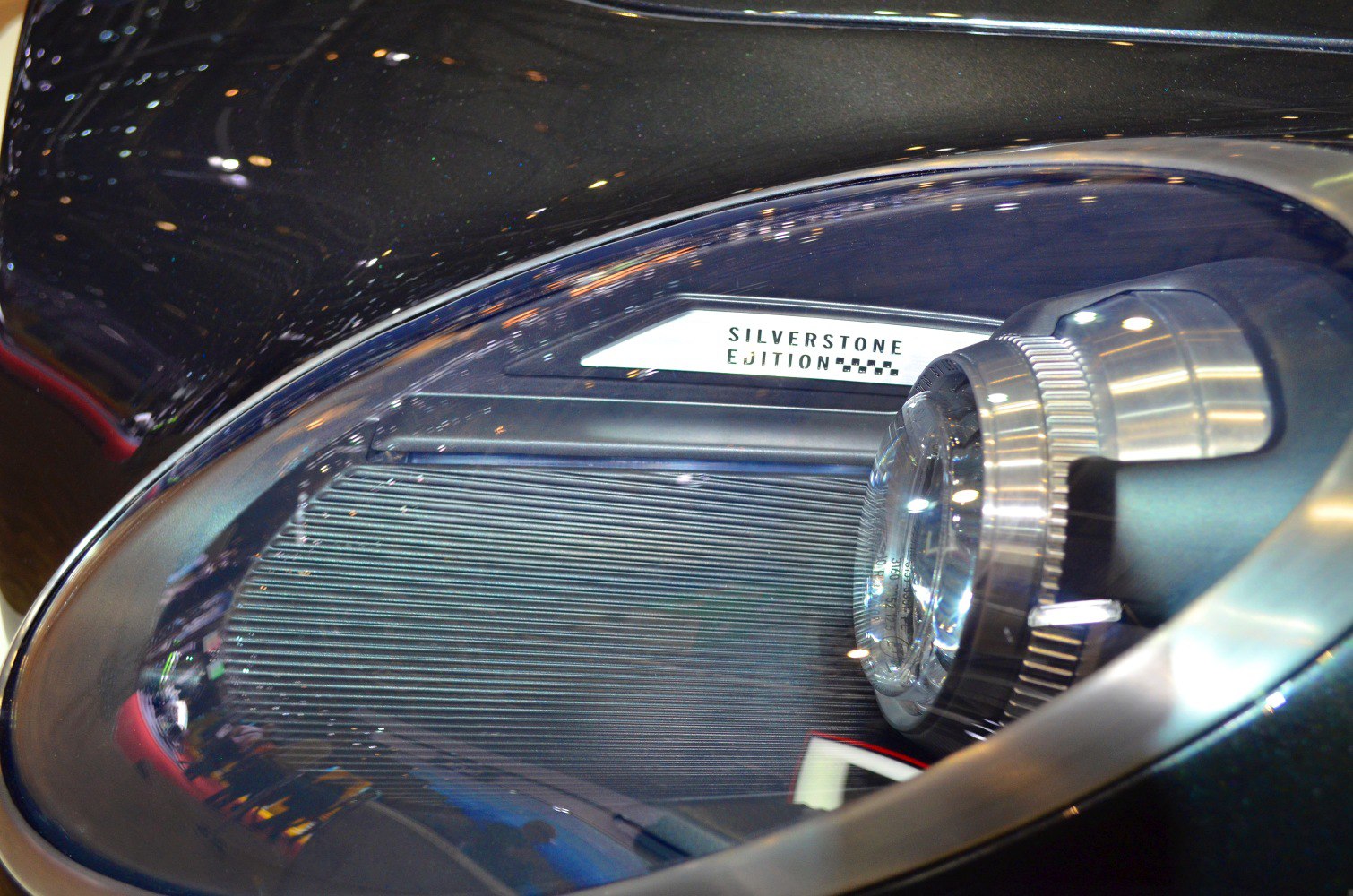 Close-up of car headlight and Silverstone Edition badge