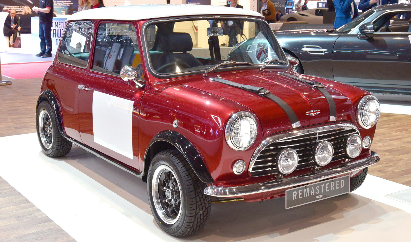 Rally lights and leather hood straps on classic vintage-style small hatchback