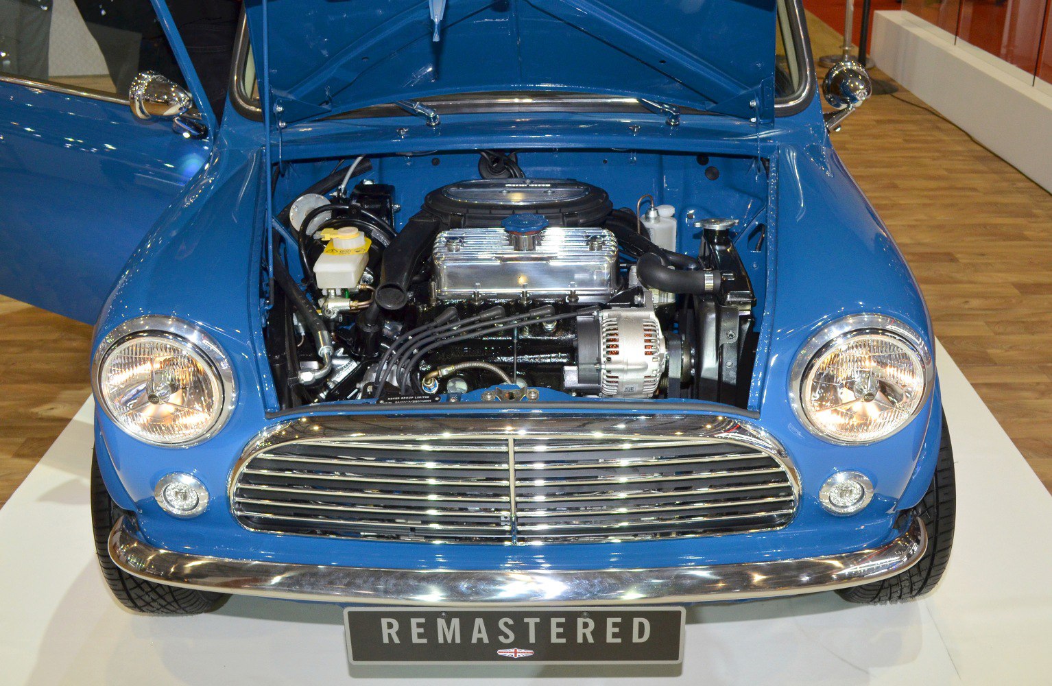 Classic Mini Remastered open hood showing engine bay details.