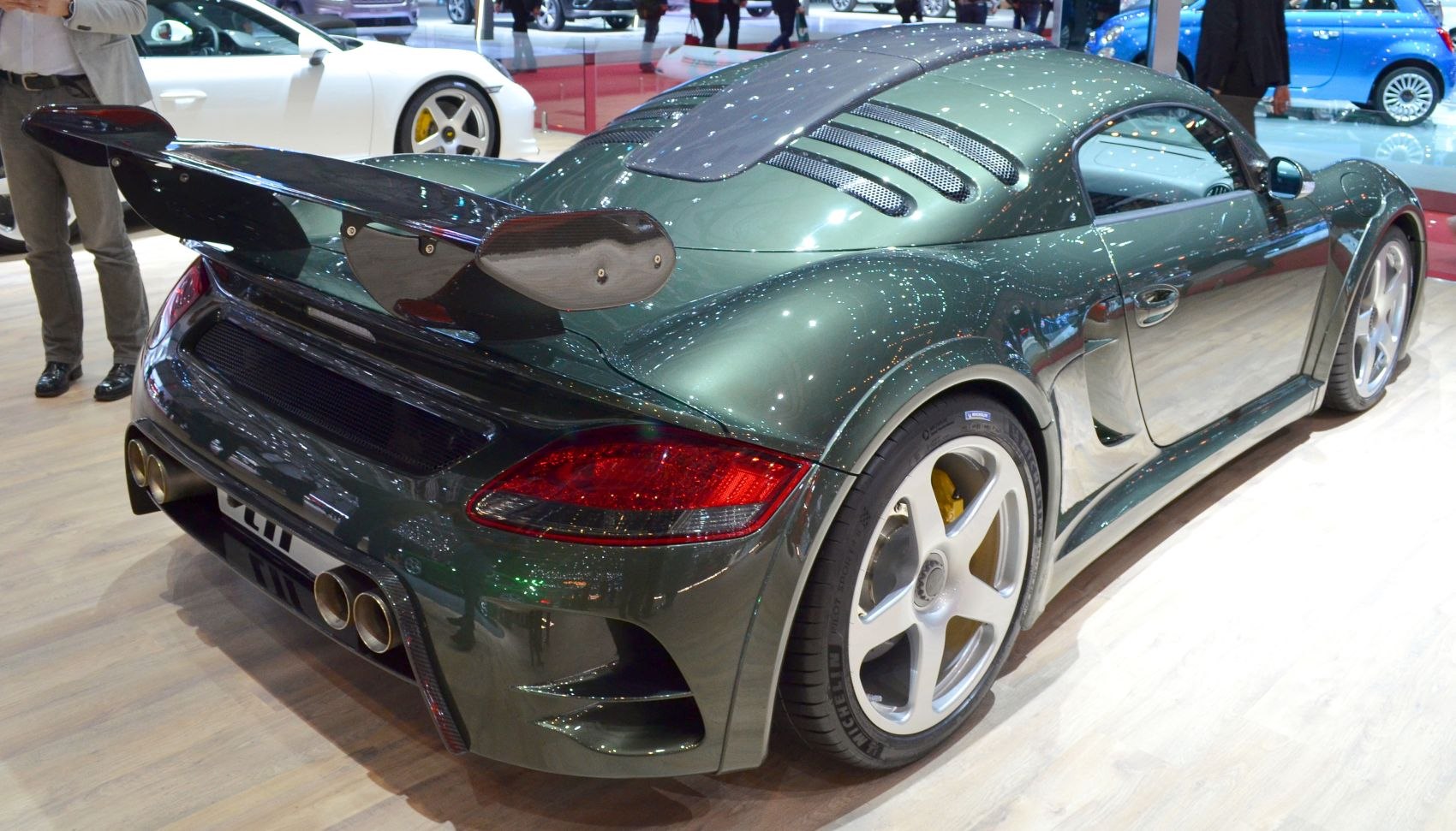 Carbon fiber rear wing and quad exhaust tips, aerodynamic rear design