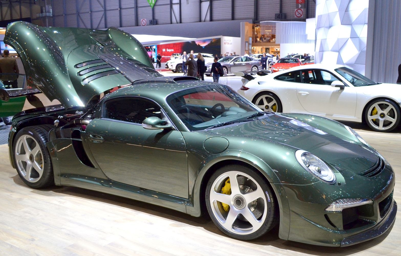 Rear engine compartment open, aerodynamic body design