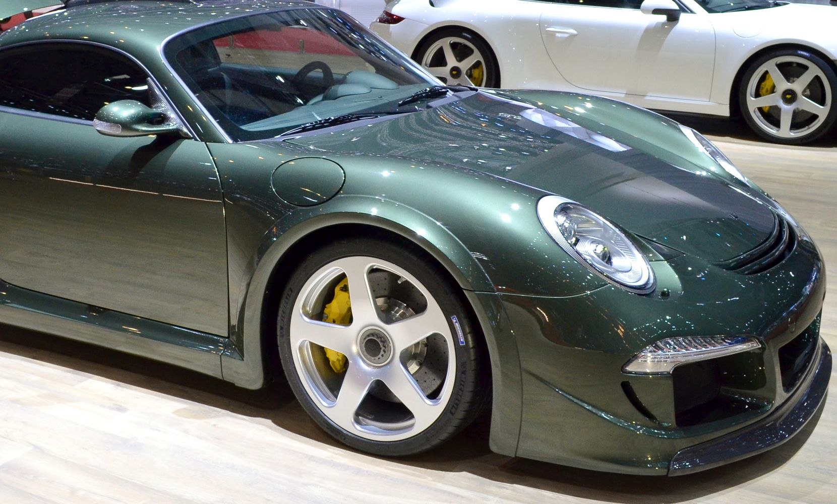 Front view with distinctive headlights and yellow brake calipers