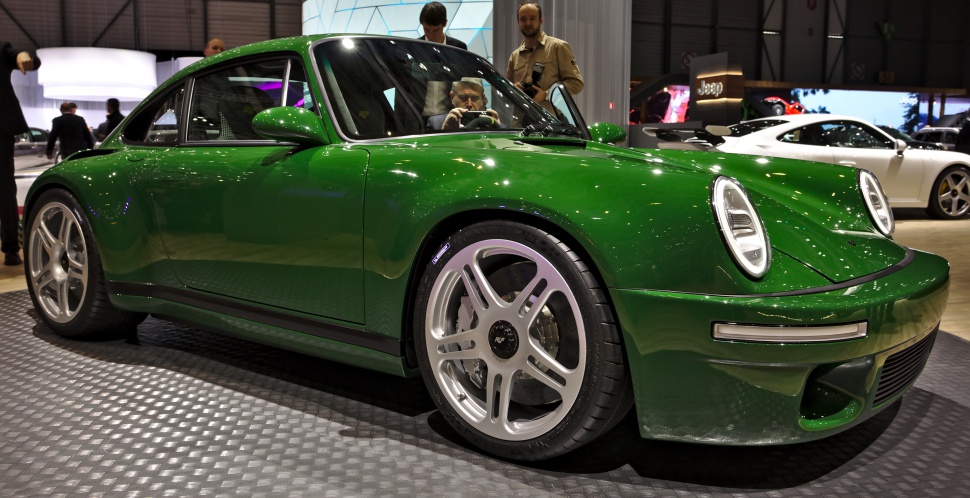 Green retro-styled sports coupe with modern alloy wheels