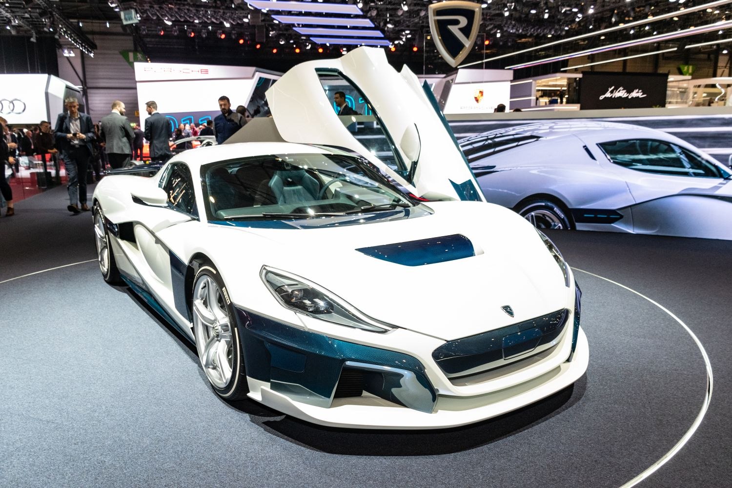 Electric hypercar with butterfly doors and aerodynamic exterior design