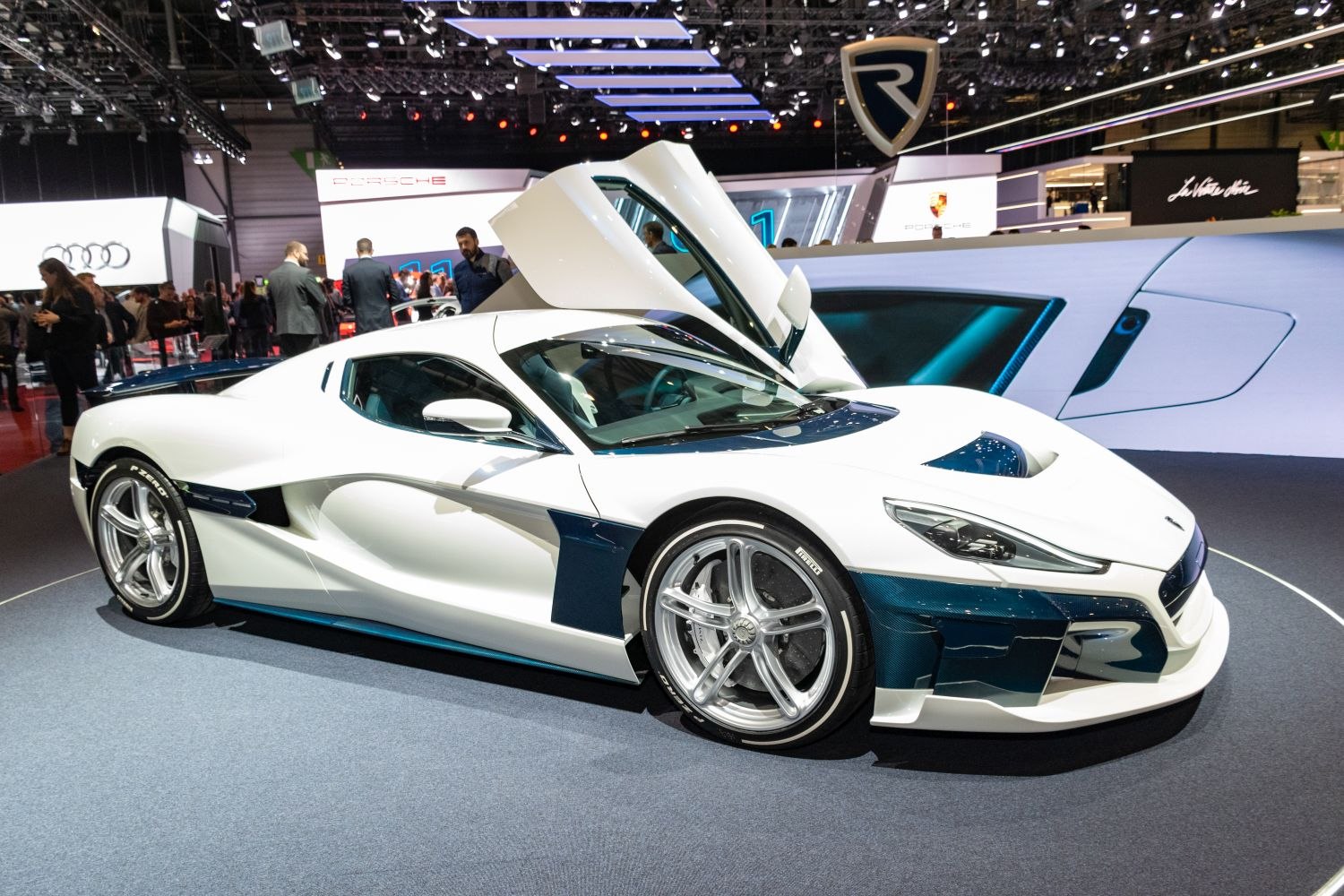 Electric supercar with scissor doors and aerodynamic side profile