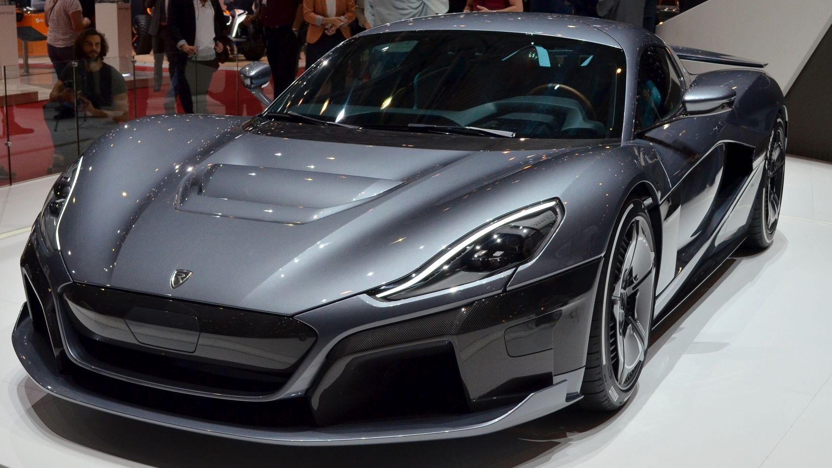 Sleek front aerodynamic design with LED headlights and performance wheels