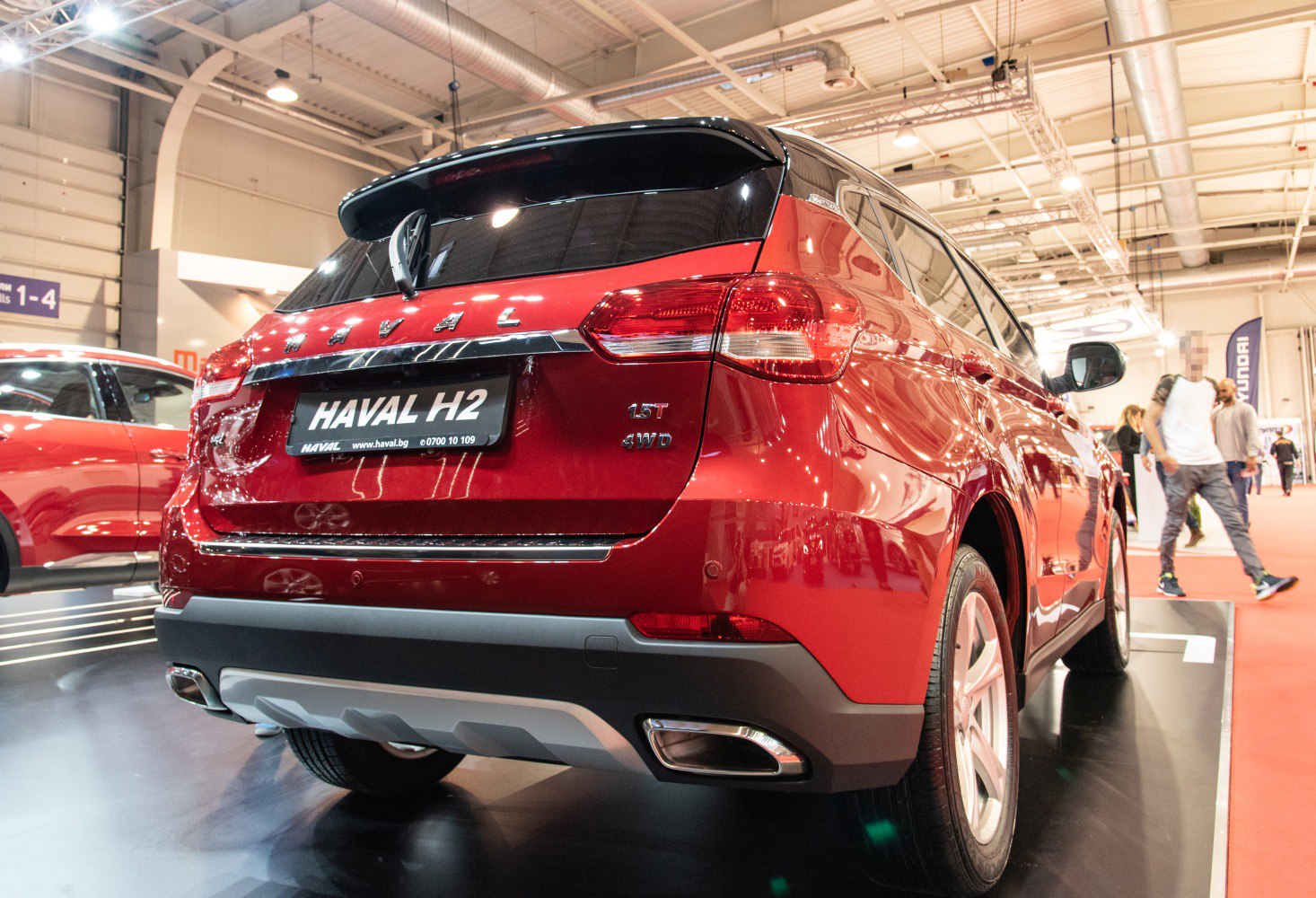 Rear view of compact SUV with 1.5T engine badge and 4WD emblem