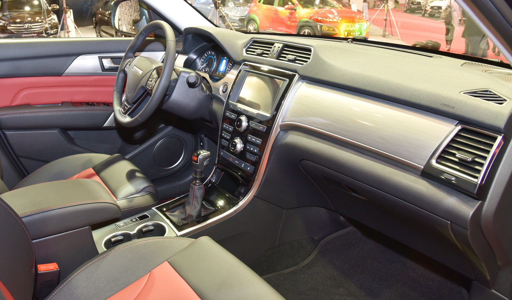 Modern car interior with dashboard, infotainment, and gear shift